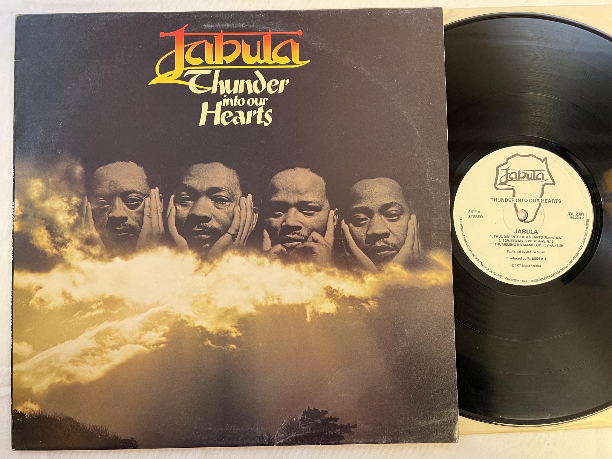 Omslagsbild för skivan JABULA thunder into our hearts LP -77 UK JABULA JBL 2001