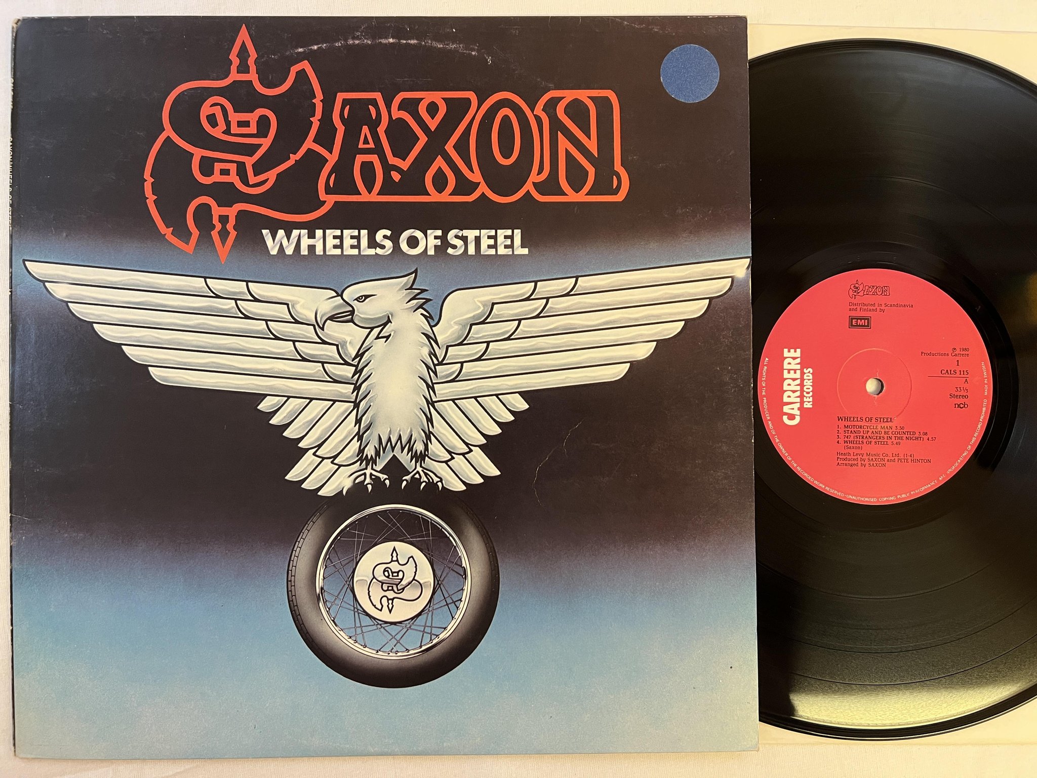 Omslagsbild för skivan SAXON wheels of steel LP -80 Fin CARRERE CALS 115