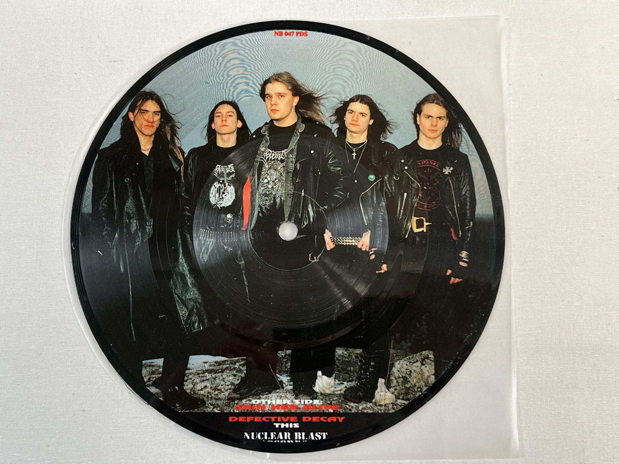 Omslagsbild för skivan DISMEMBER Skin Her Alive 7" PICTURE DISC buclear NB 047 PDS death metal