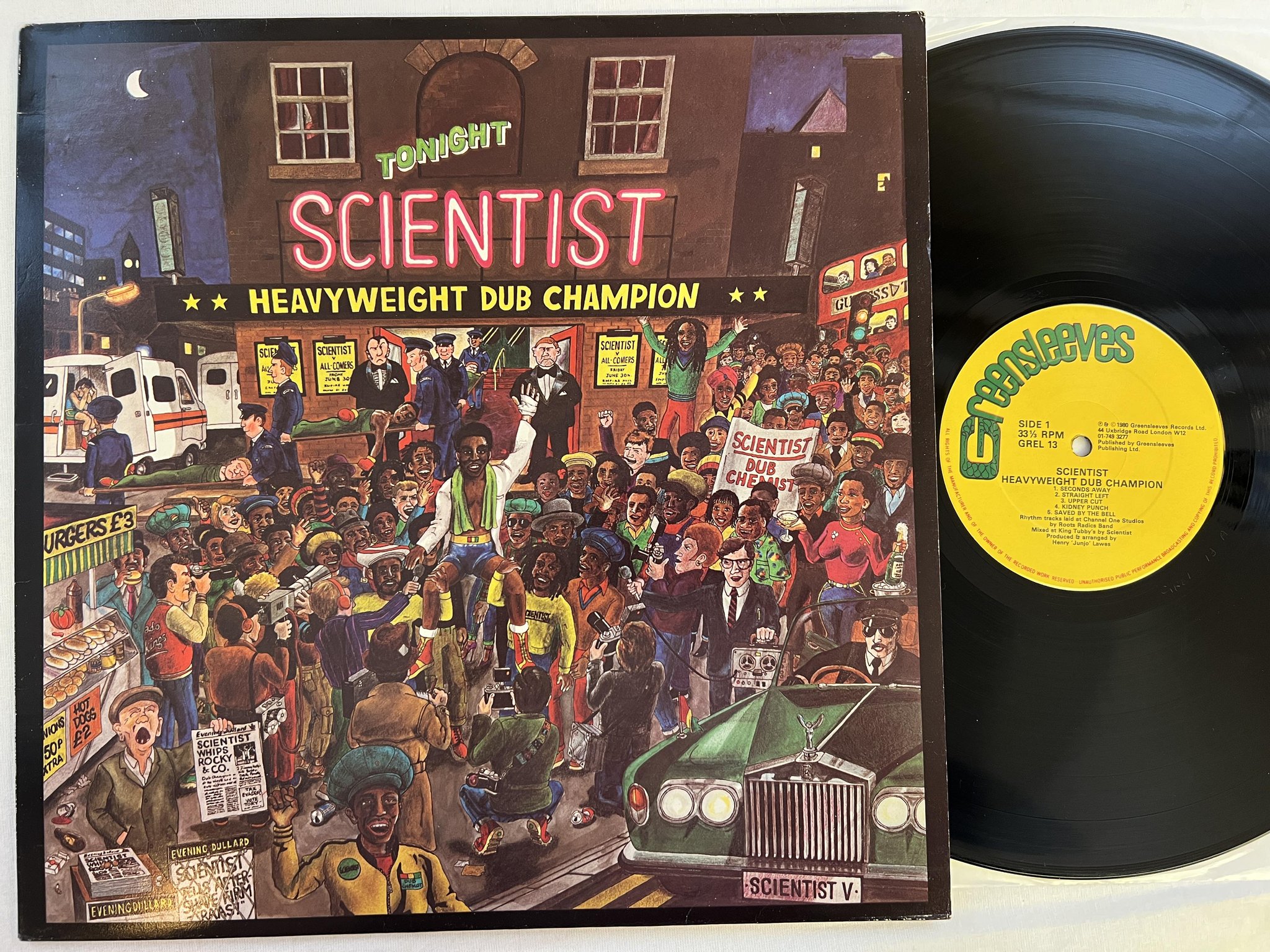 Omslagsbild för skivan SCIENTIST heavyweight dub champion LP -80 UK GREENSLEEVES GREL 13