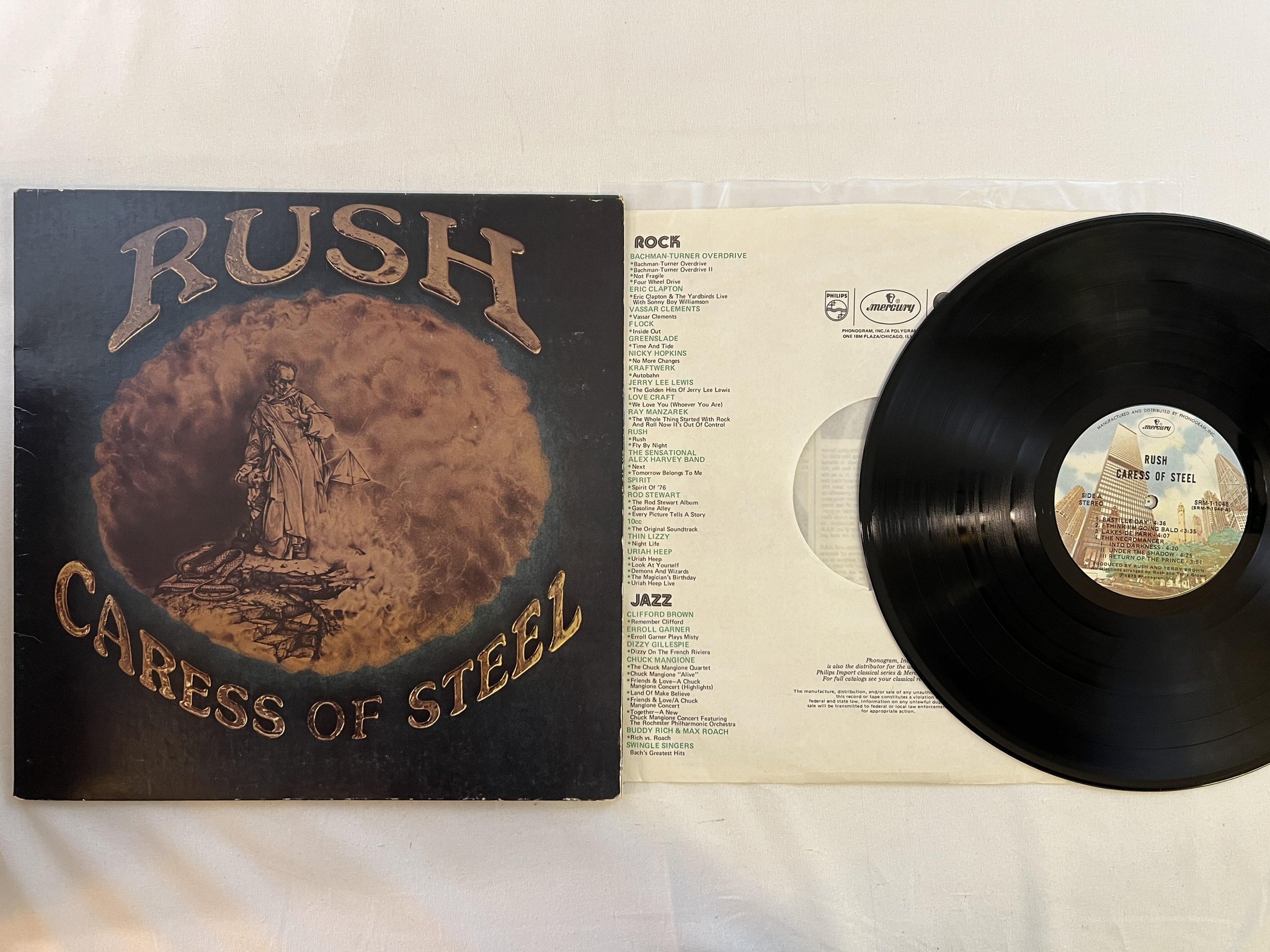 Omslagsbild för skivan RUSH caress of steel LP -75 MERCURY SRM-1 1048