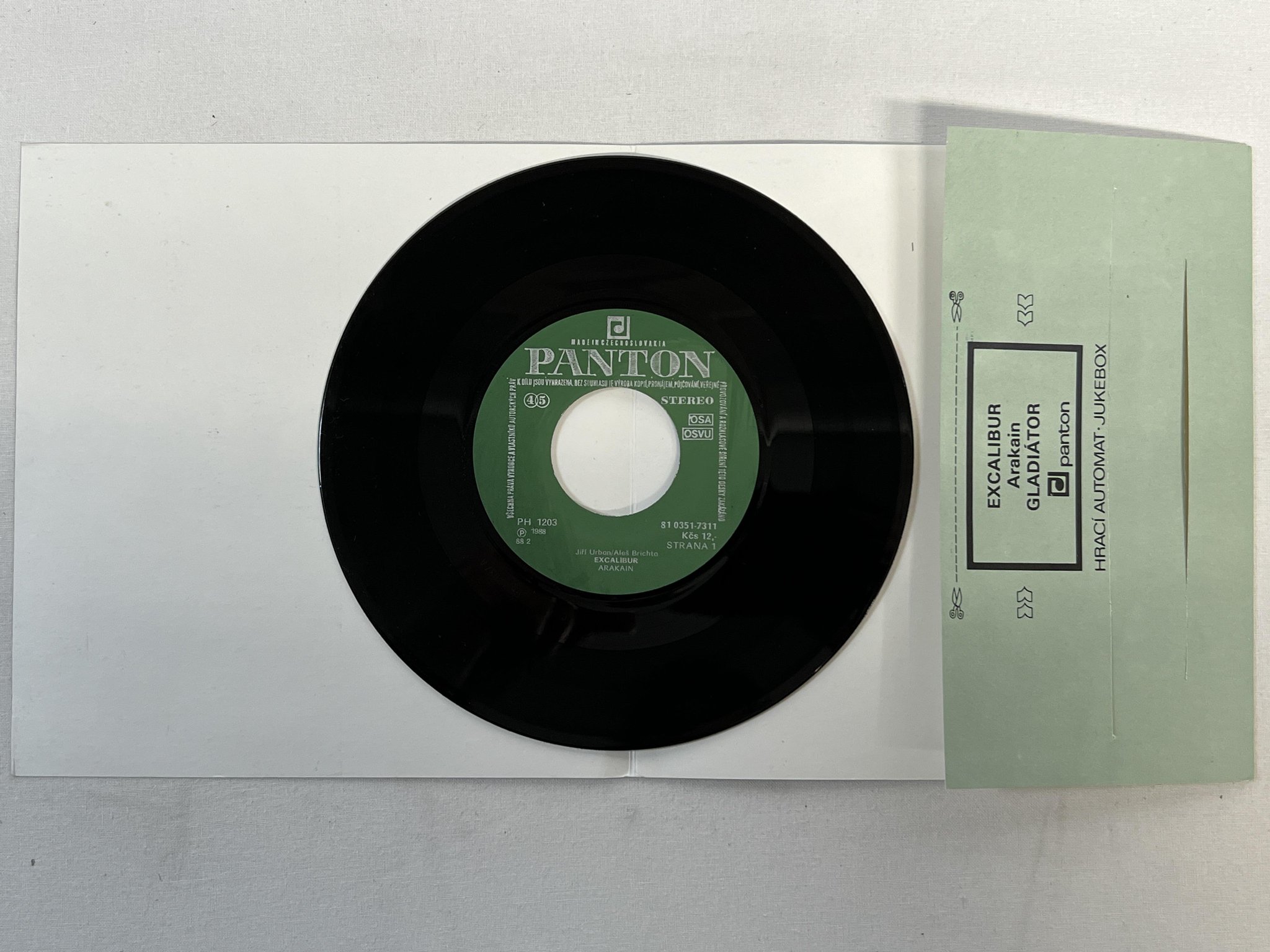 Omslagsbild för skivan ARAKAIN excalibur 7"single -88 PANTON 81 0351-7311 TRASH ** rare **