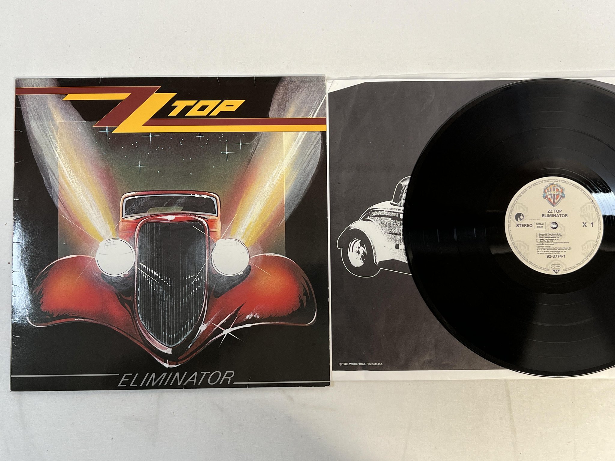 Omslagsbild för skivan ZZ TOP eliminator LP -83 Ger WARNER 92-3774-1