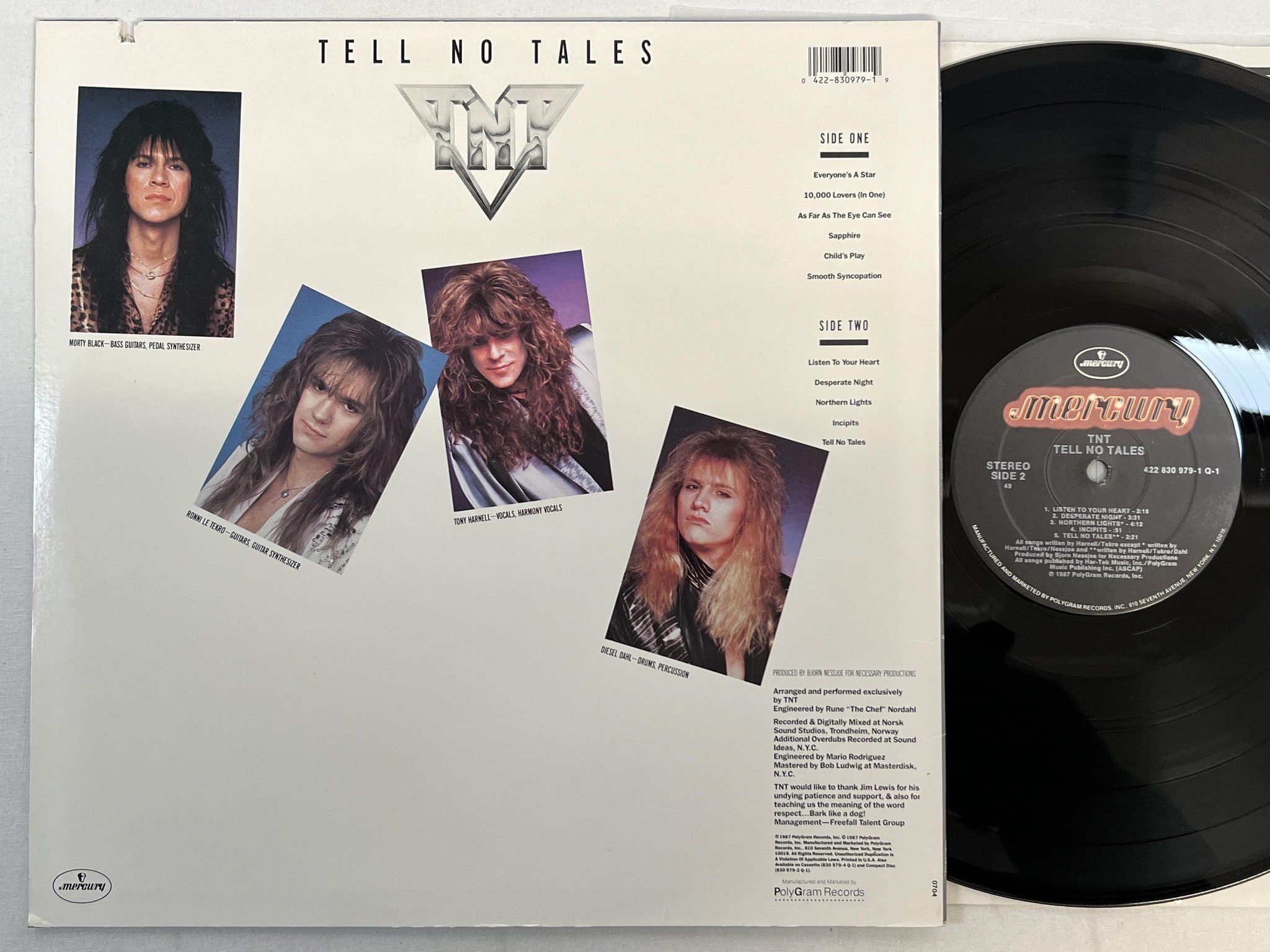 Omslagsbild för skivan TNT tell no tales LP -87 US MERCURY 422 830 979-1 Q-1