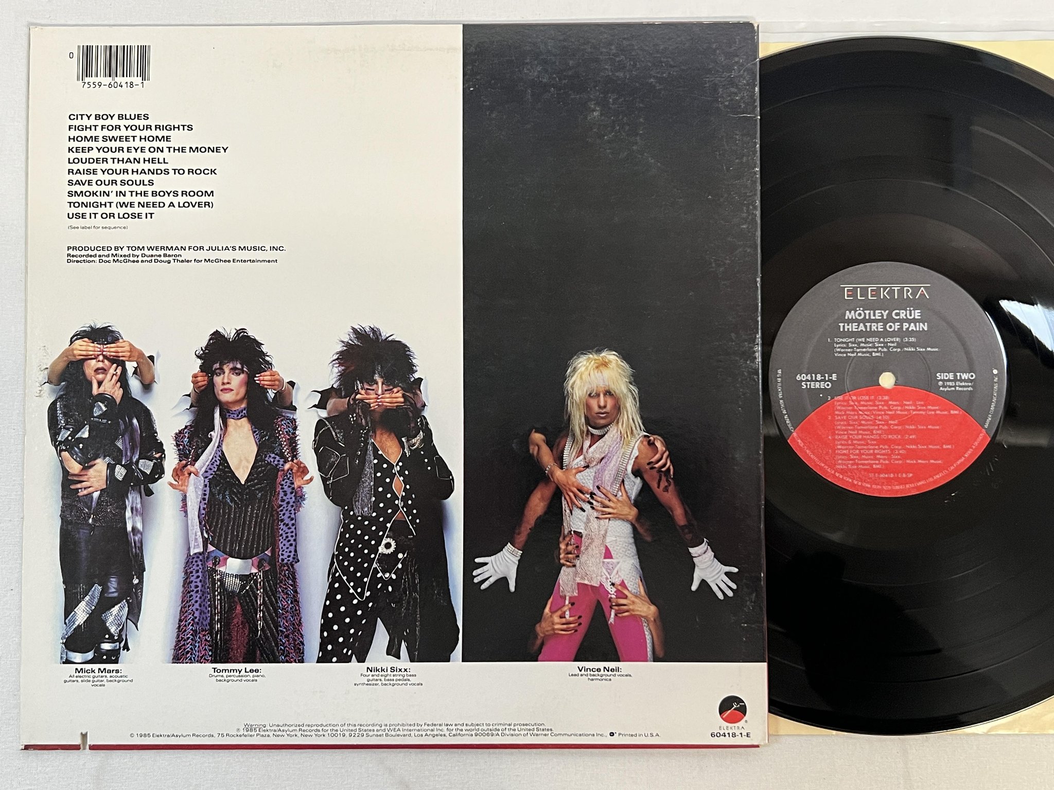 Omslagsbild för skivan MÖTLEY CRÜE theatre of pain LP -85 US ELEKTRA 60418-1-E
