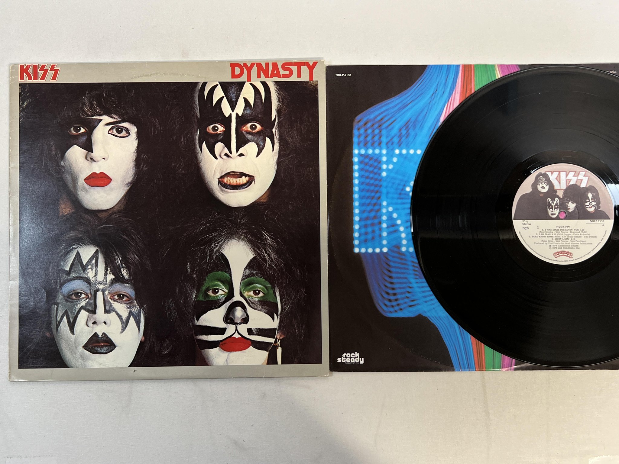 Omslagsbild för skivan KISS dynasty LP -79 ncb CASABLANCA NBLP 7152 w/ poster