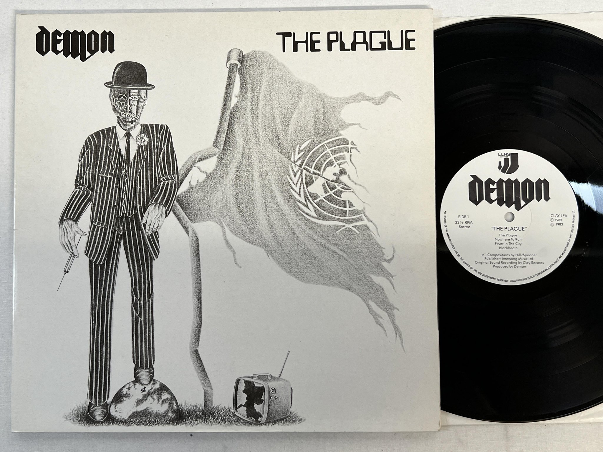 Omslagsbild för skivan DEMON the plague LP -83 CLAY LP6