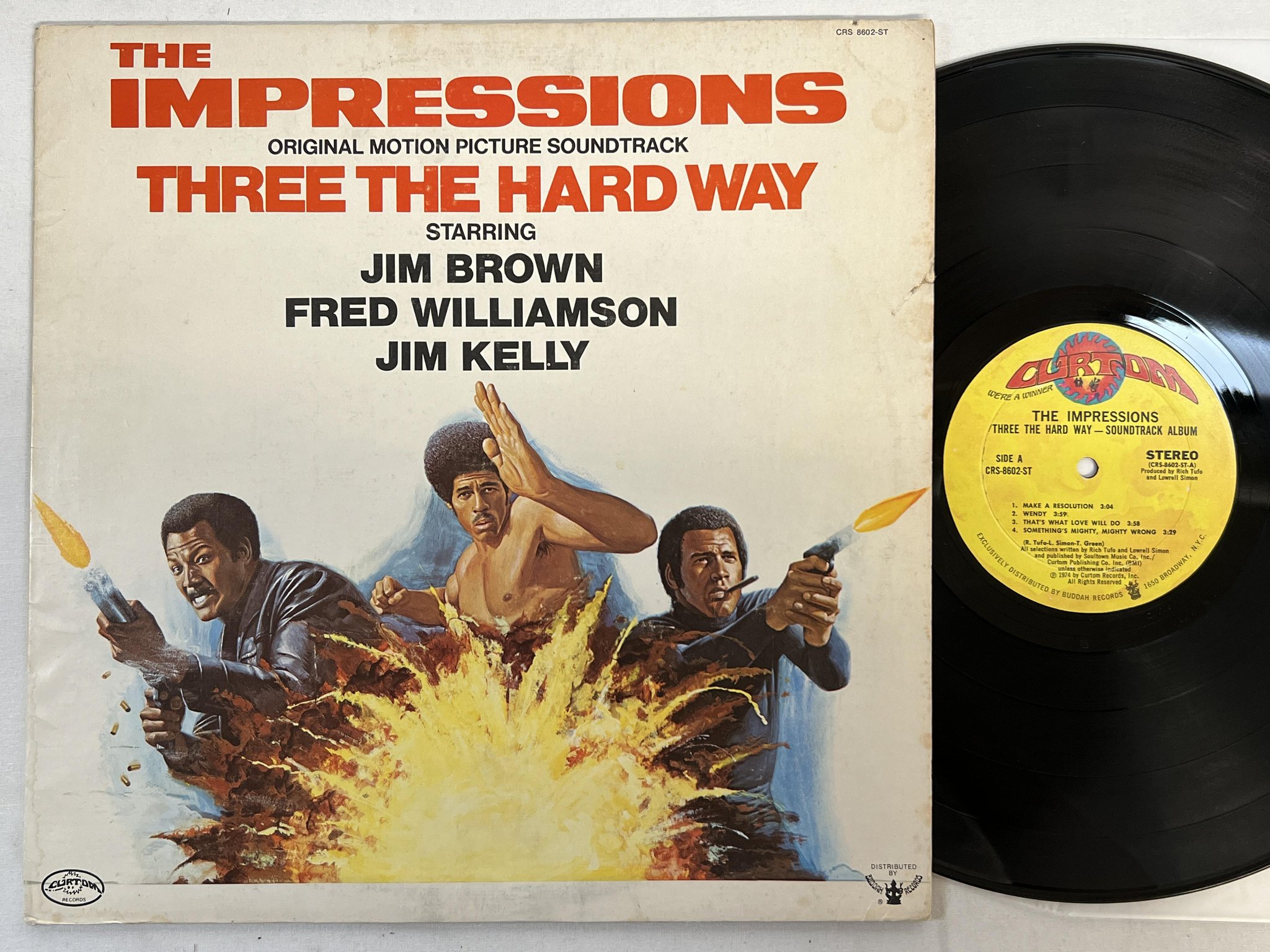 Omslagsbild för skivan THE IMPRESSIONS three the hard way LP -74 US CURTOM blaxploitation