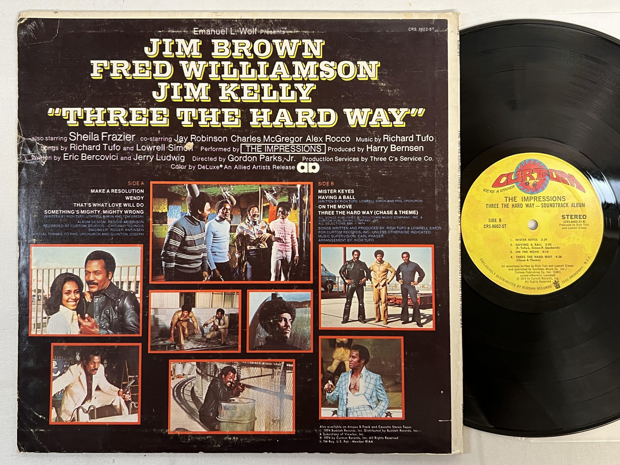 Omslagsbild för skivan THE IMPRESSIONS three the hard way LP -74 US CURTOM blaxploitation