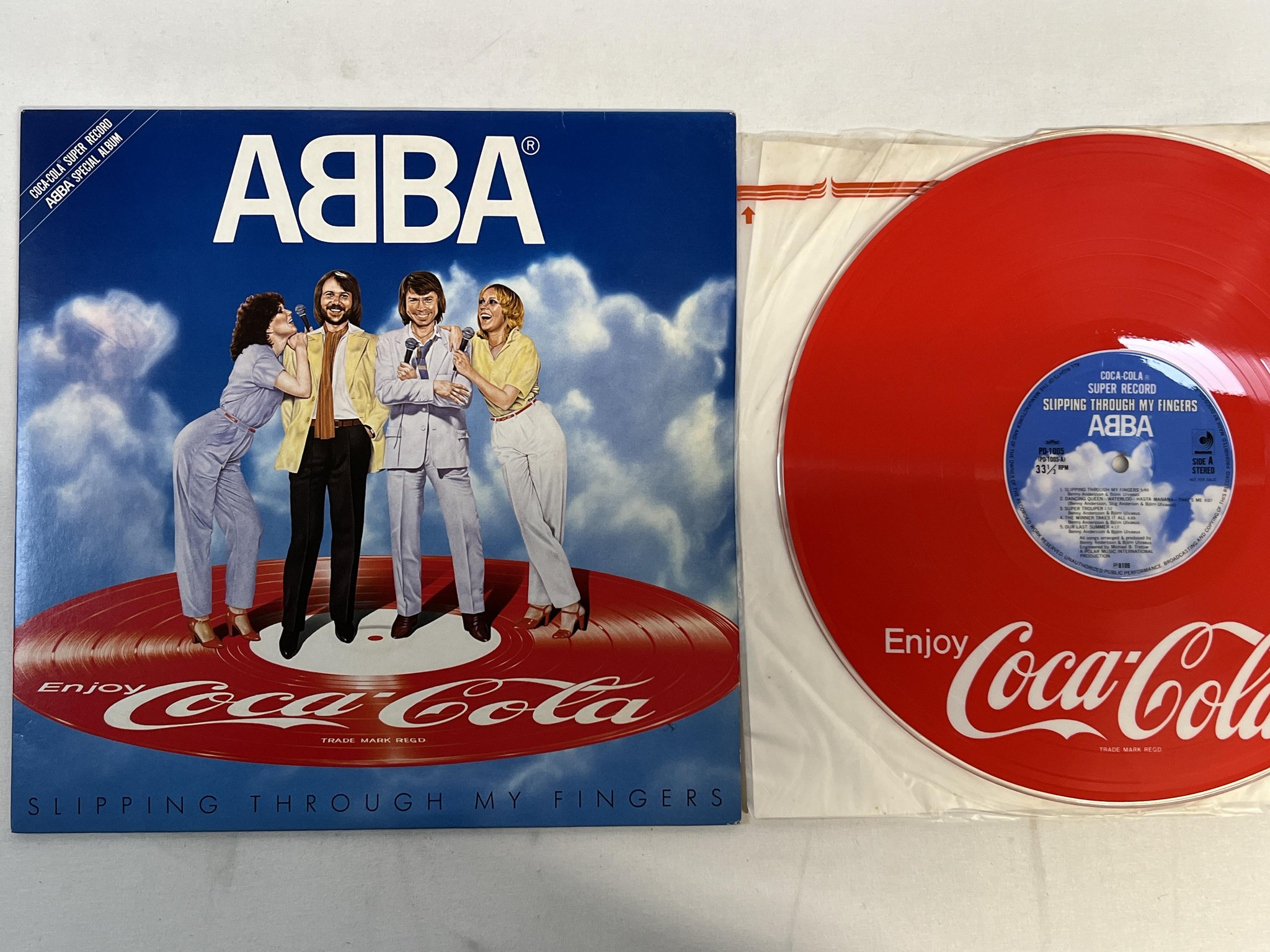 Omslagsbild för skivan ABBA slipping through my fingers LP -81 Japan DISCOMATE / COCA-COLA PD 1005