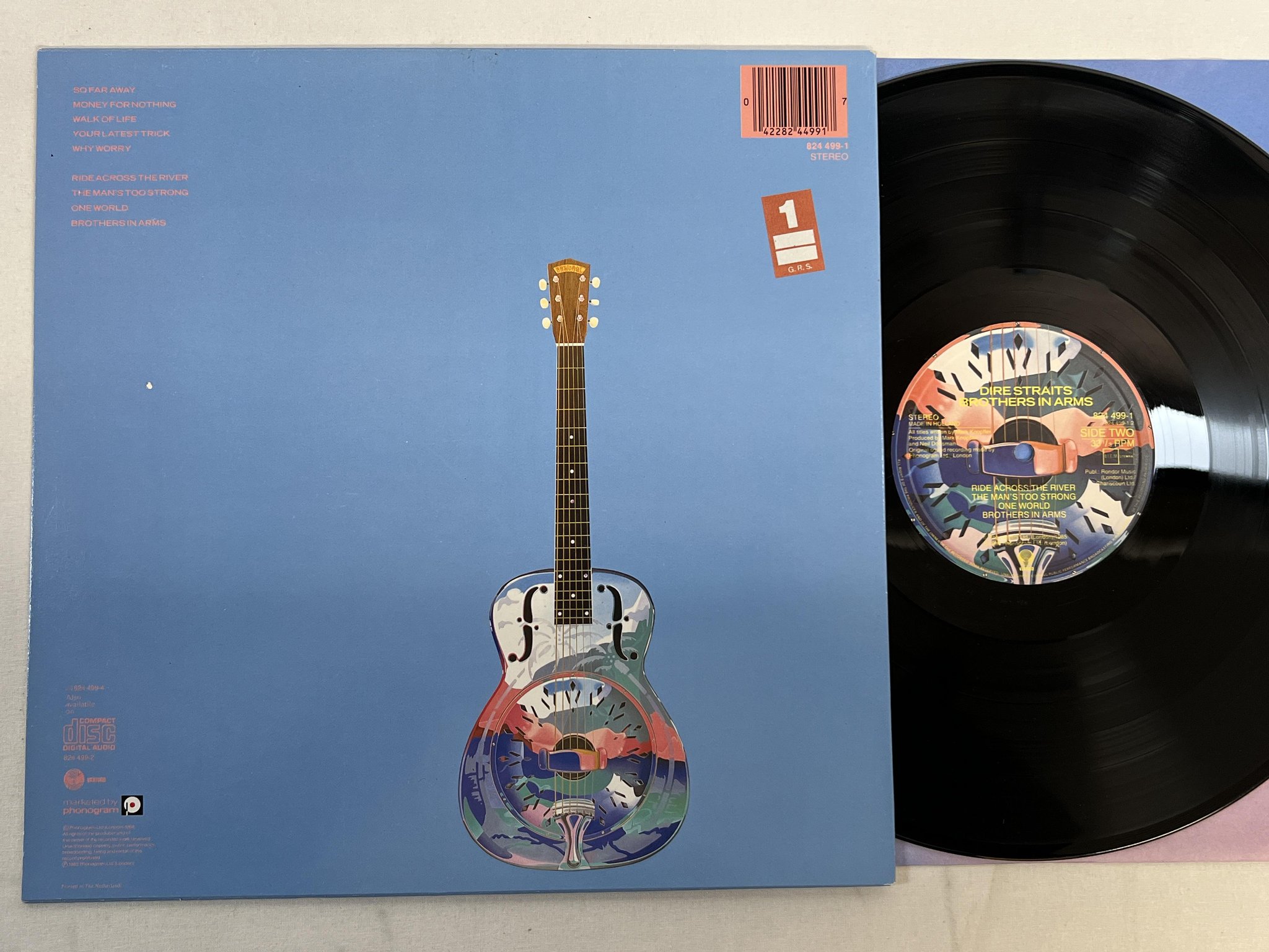 Omslagsbild för skivan DIRE STRAITS brothers in arms LP -85 Hol VERTIGO 824 499-1