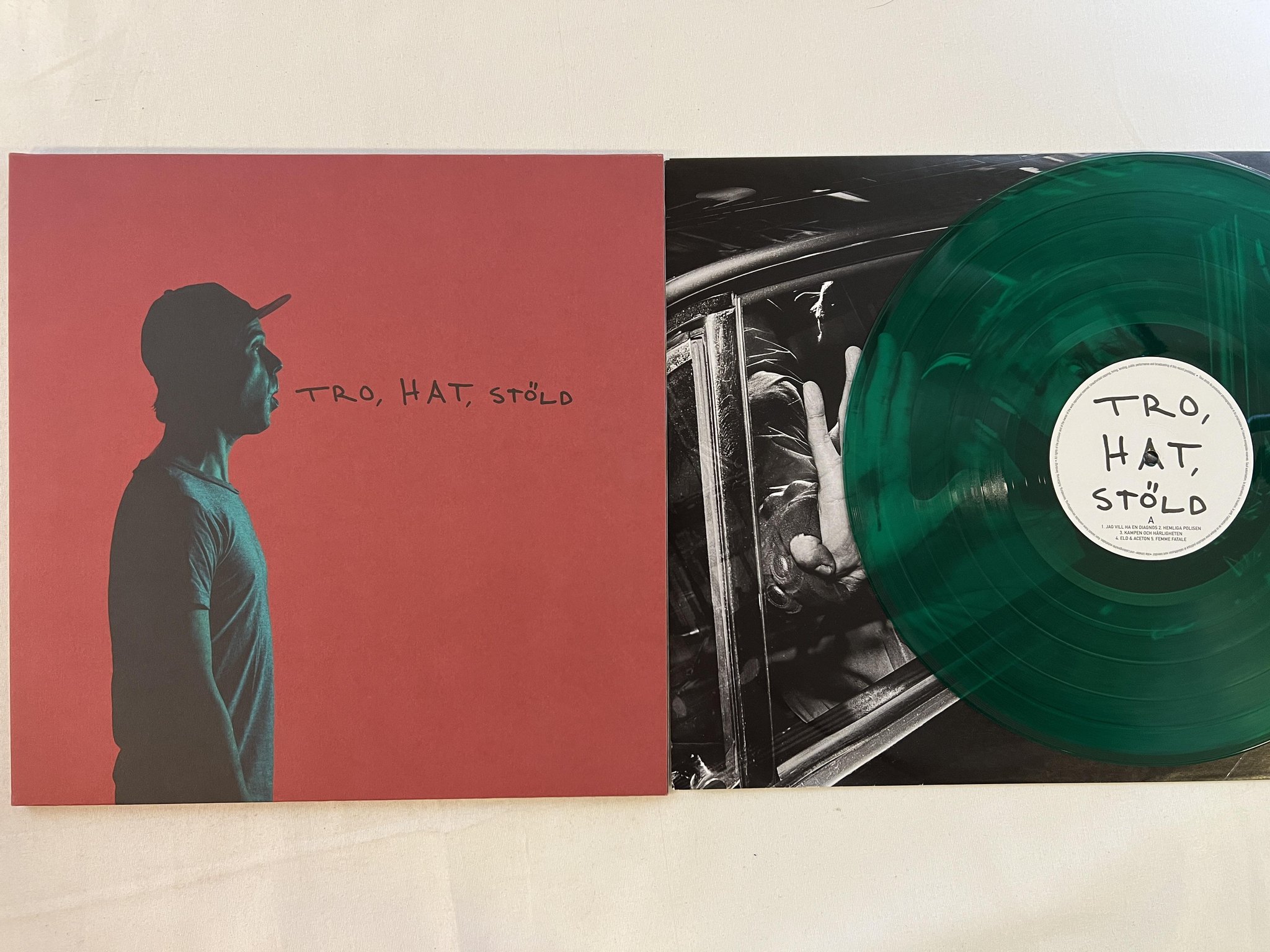 Omslagsbild för skivan TIMO RÄISÄNEN Tro, Hat, Stöld LP 2017 Swe KNIC 005 ** green vinyl **