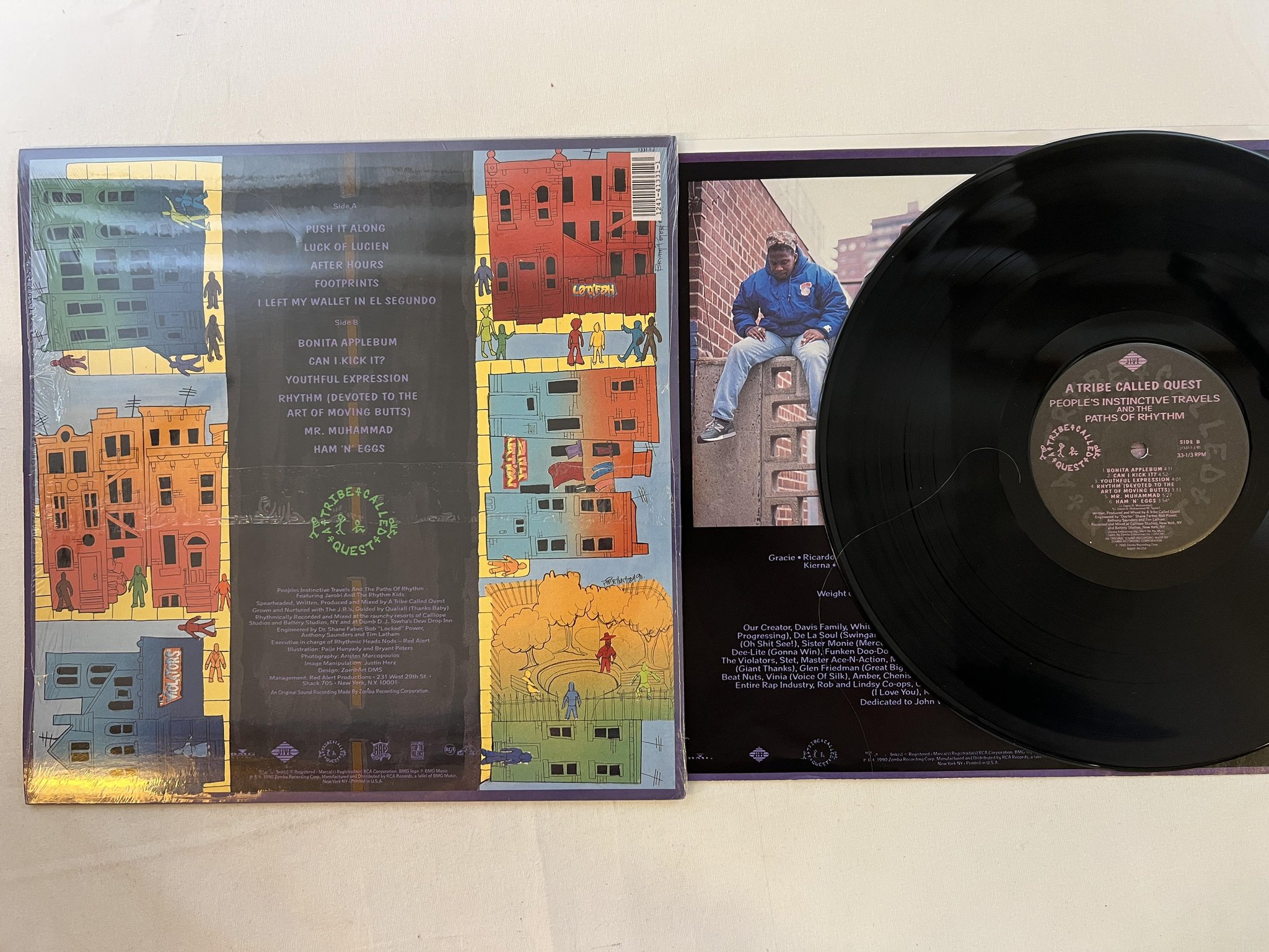 Omslagsbild för skivan A TRIBE CALLED QUEST People's Instinctive Travels LP -90 US JIVE hype sticker !