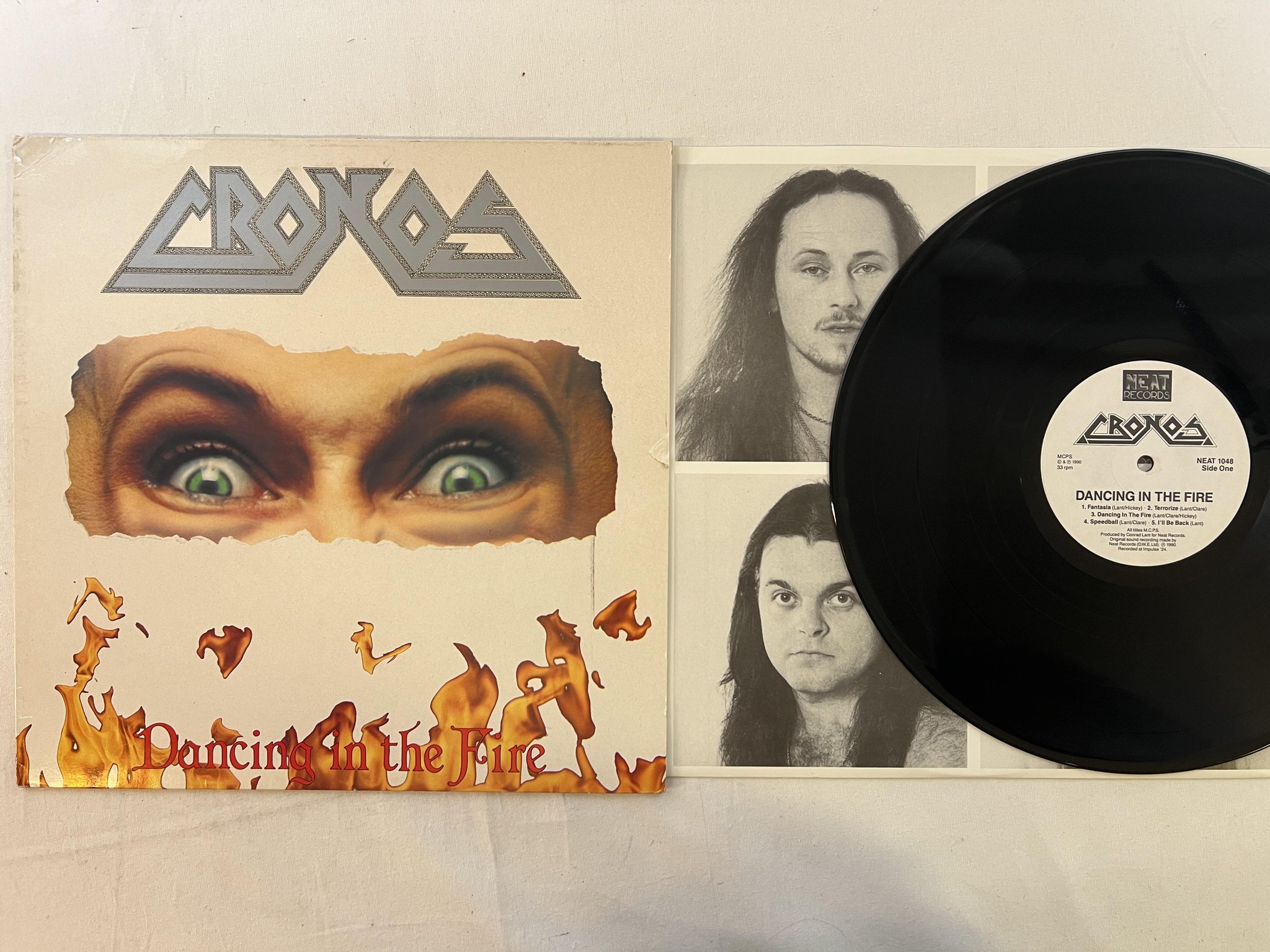 Omslagsbild för skivan CRONOS Dancing In The Fire LP -90 UK neat LP1048