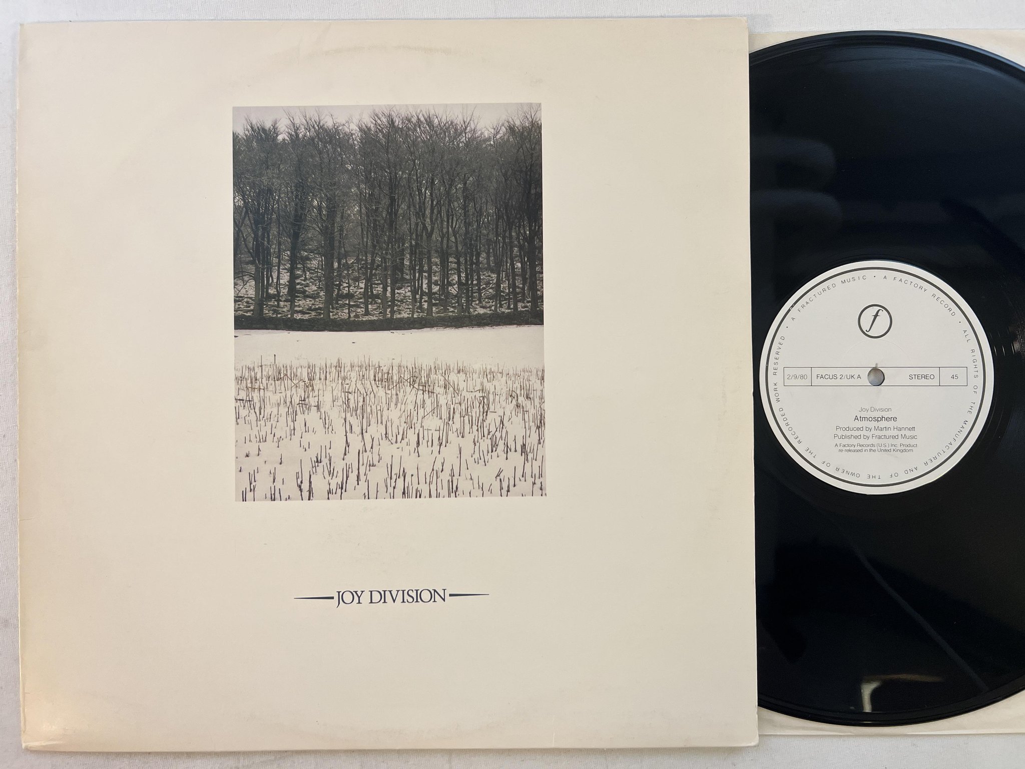 Omslagsbild för skivan JOY DIVISION atmosphere 12"single 80 UK FACTORY FACUS 2 ** Red tranclucent **