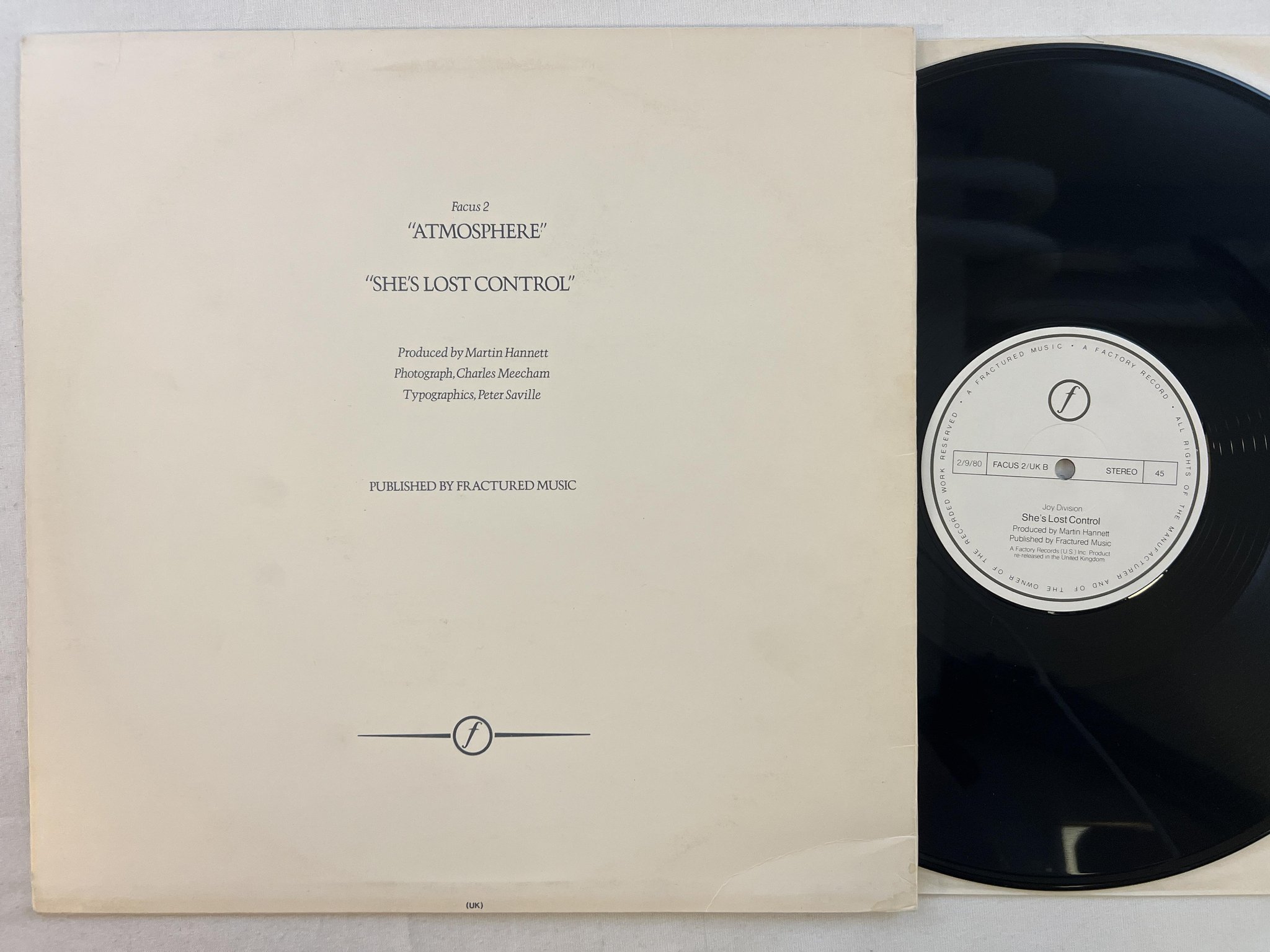 Omslagsbild för skivan JOY DIVISION atmosphere 12"single 80 UK FACTORY FACUS 2 ** Red tranclucent **