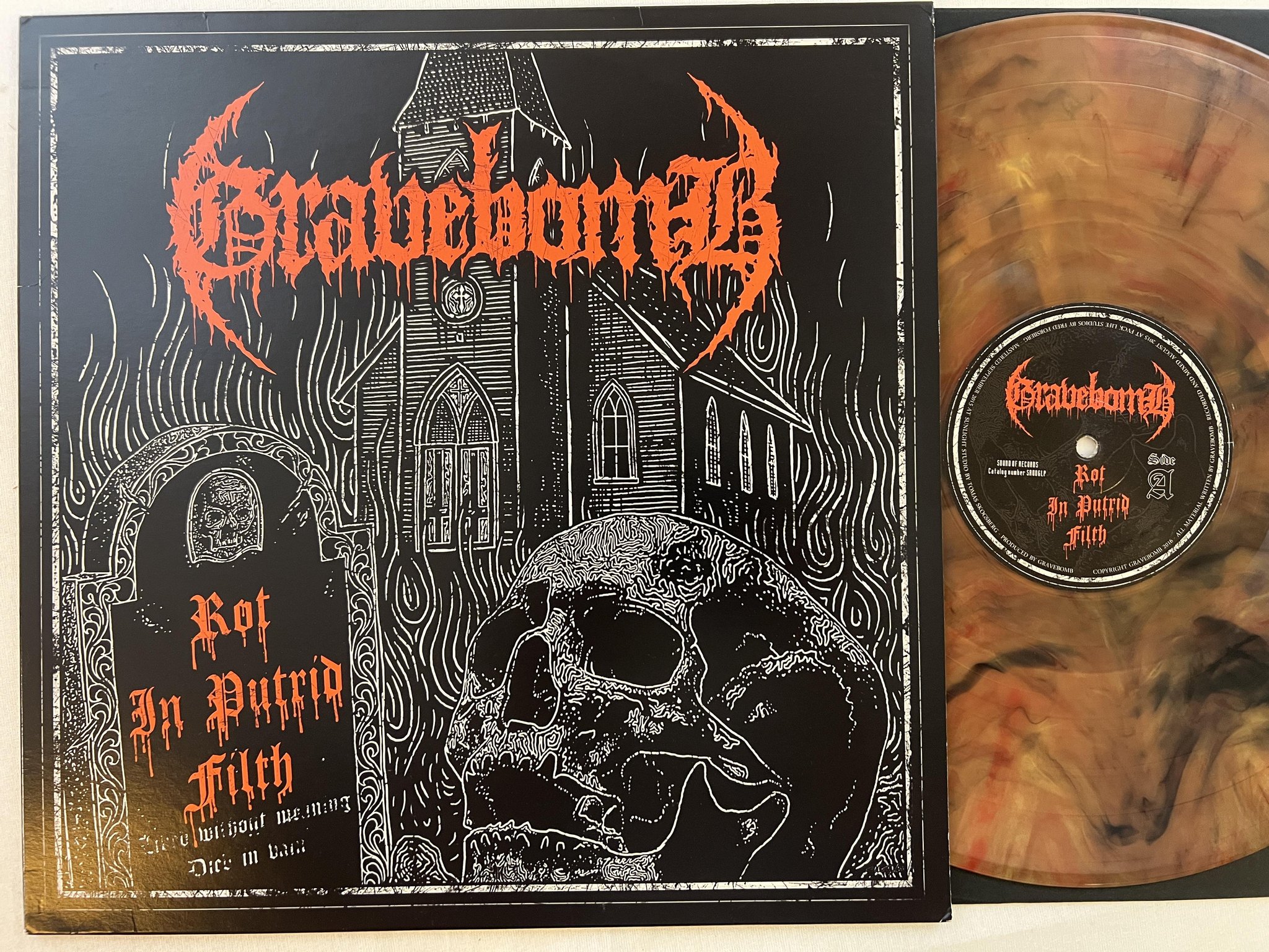 Omslagsbild för skivan GRAVEBOMB Rot In Putrid Filth LP 2017 SOUND OF RECORDS SP006LP orange vinyl