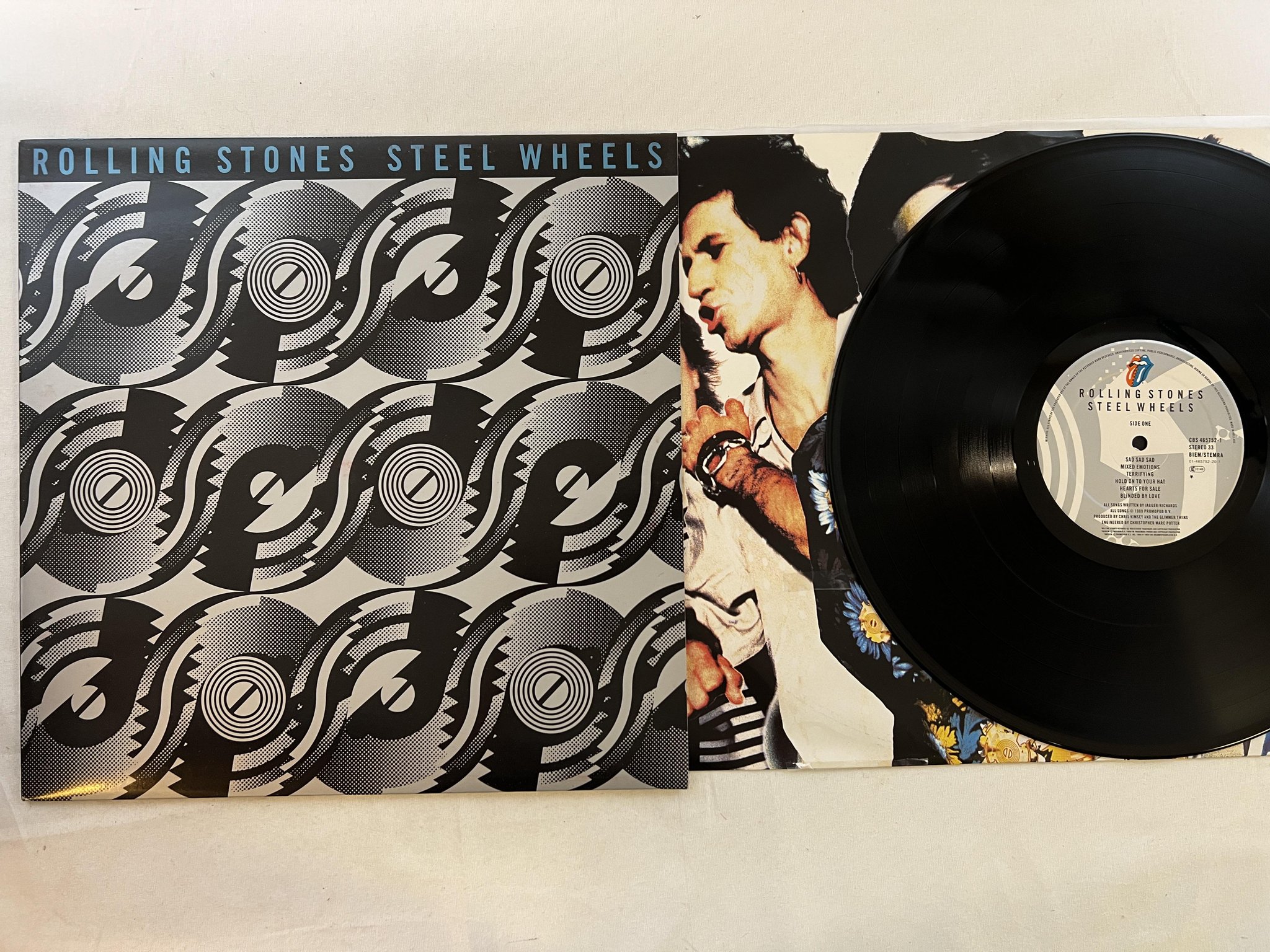 Omslagsbild för skivan THE ROLLING STONES steel wheels LP -89 Hol CBS 465752-1