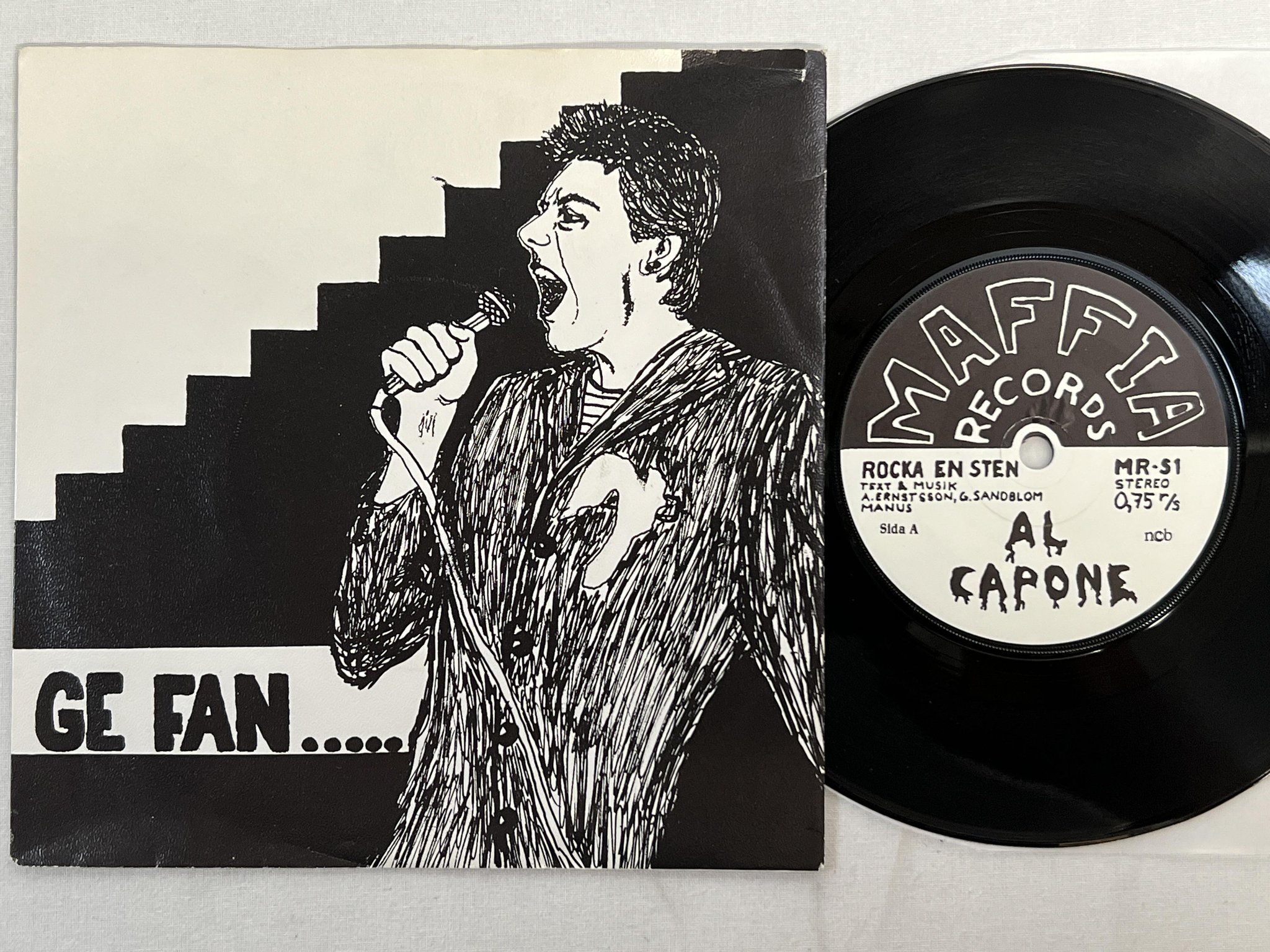 Omslagsbild för skivan AL CAPONE rocka en sten 7"single -79 MAFFIA RECORDS MR-S1 punk rock