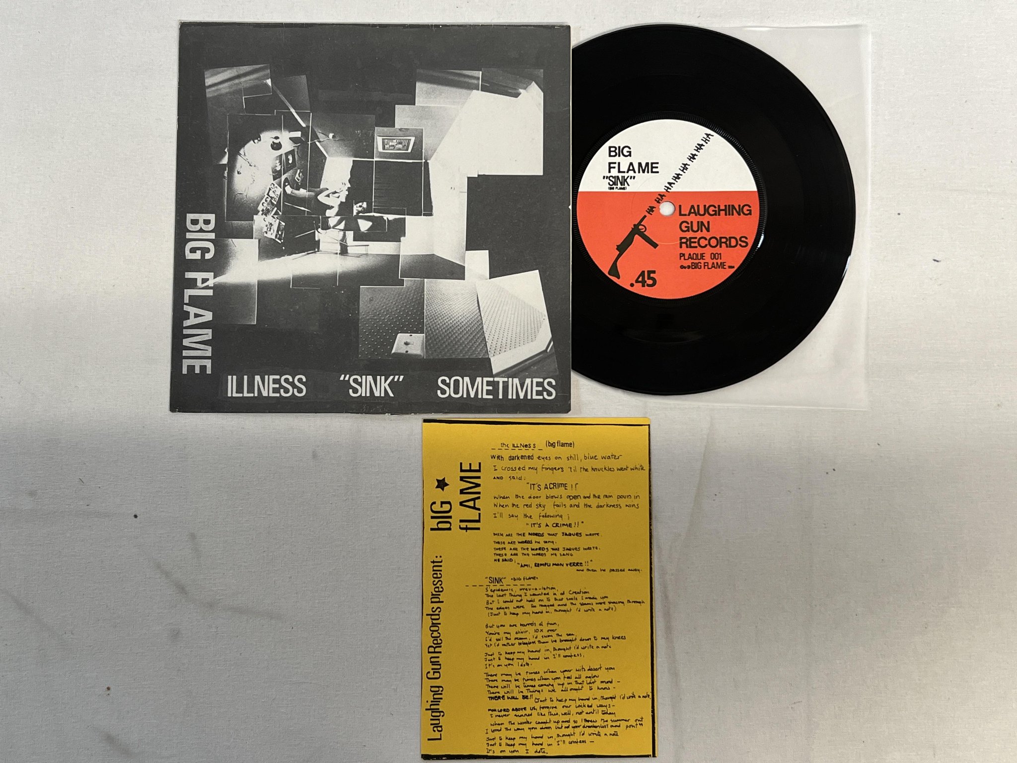 Omslagsbild för skivan BIG FLAME sink 7"single -84 UK LAUGHING GUN PLAQUE 001