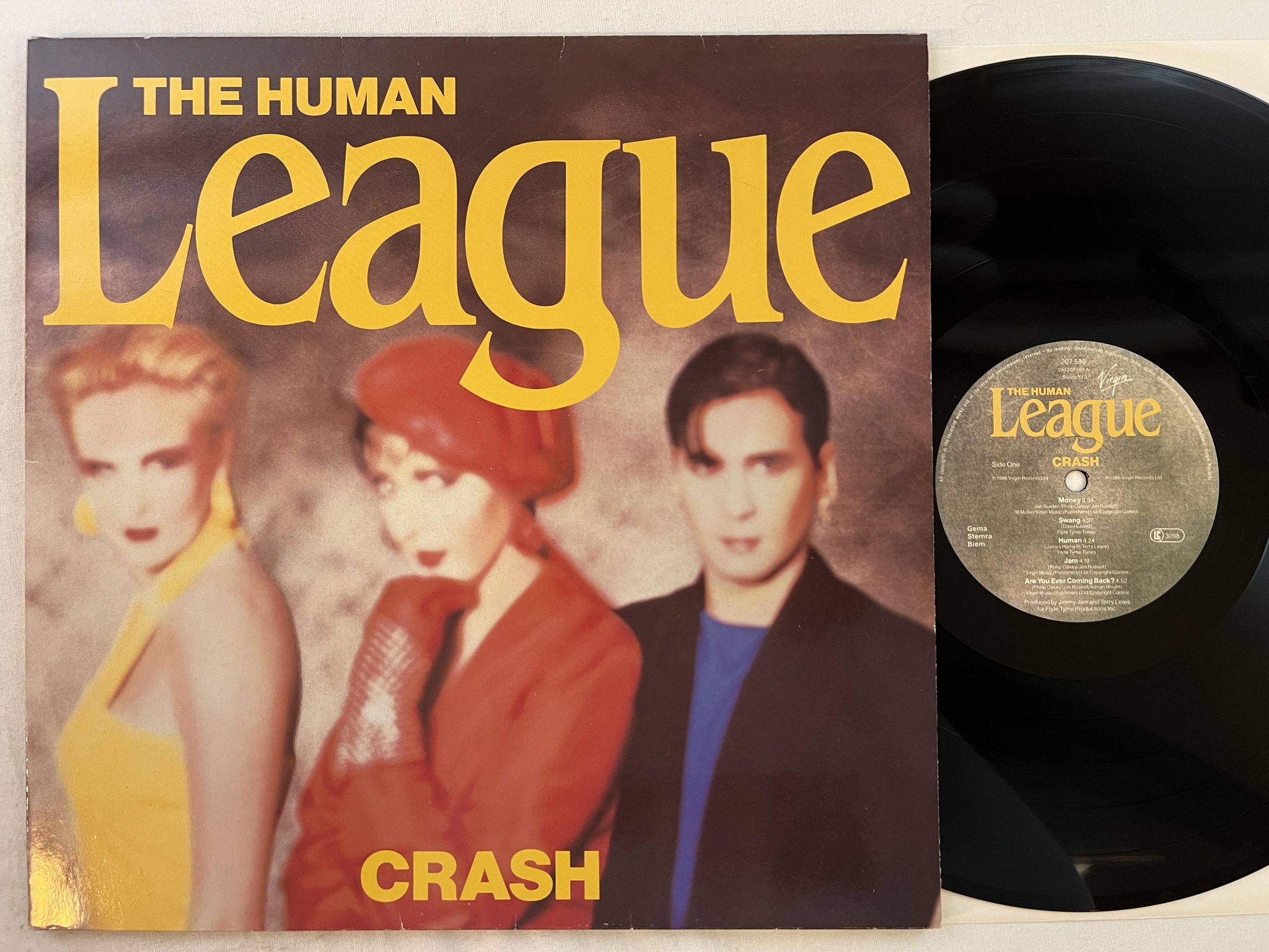 Omslagsbild för skivan THE HUMAN LEAGUE crash LP -86 VIRGIN 207 589