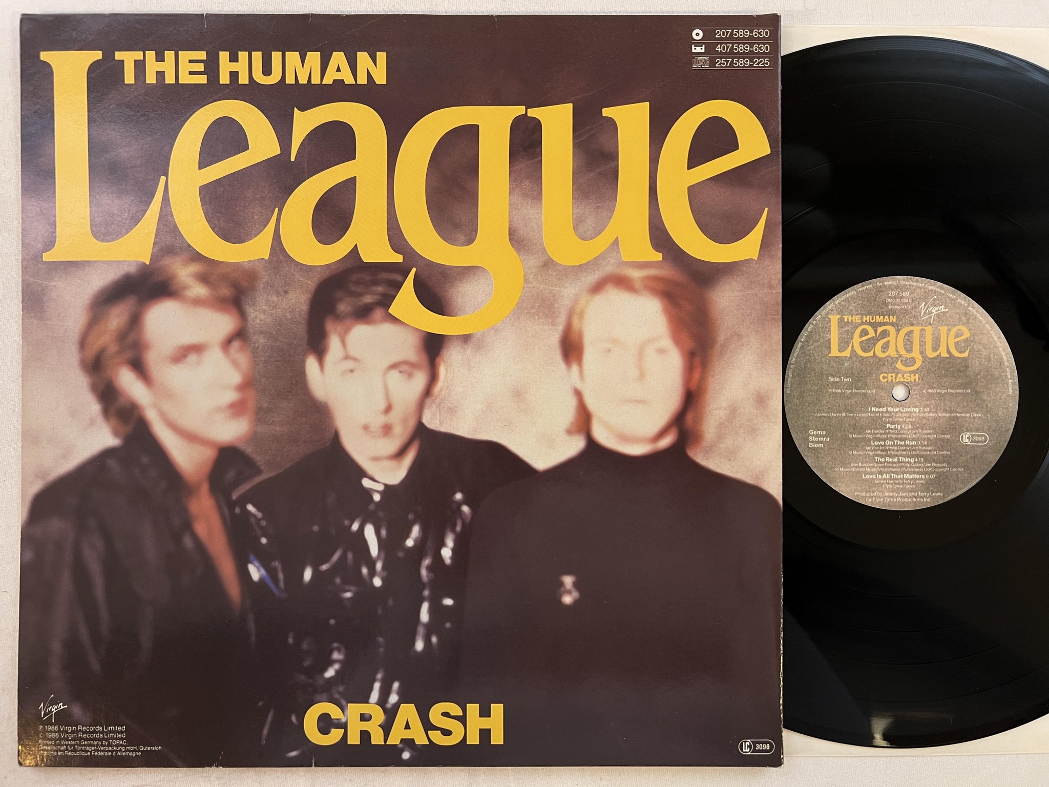 Omslagsbild för skivan THE HUMAN LEAGUE crash LP -86 VIRGIN 207 589