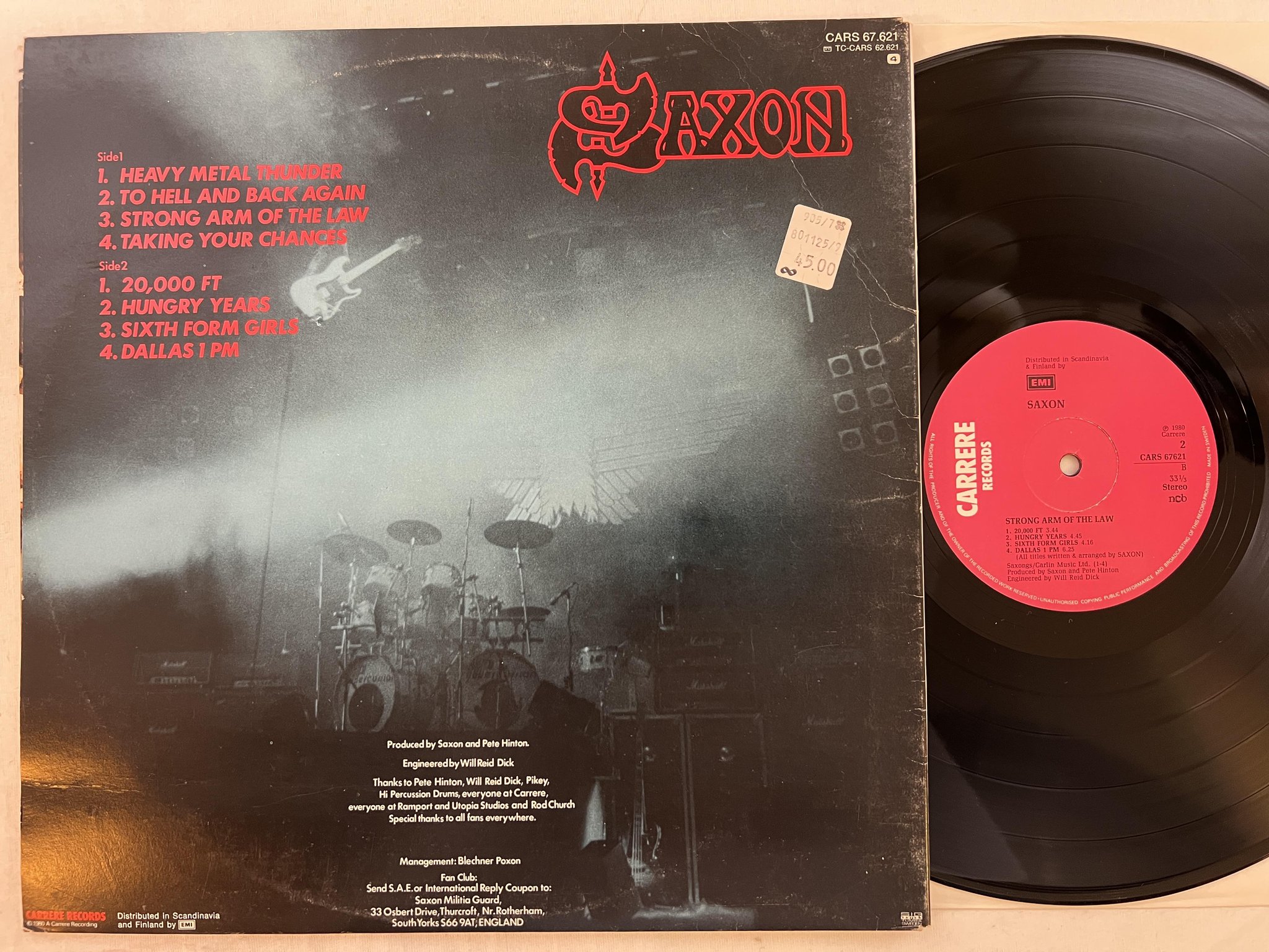 Omslagsbild för skivan SAXON strong arm of the law LP -80 ncb CARRERE CARS 67621