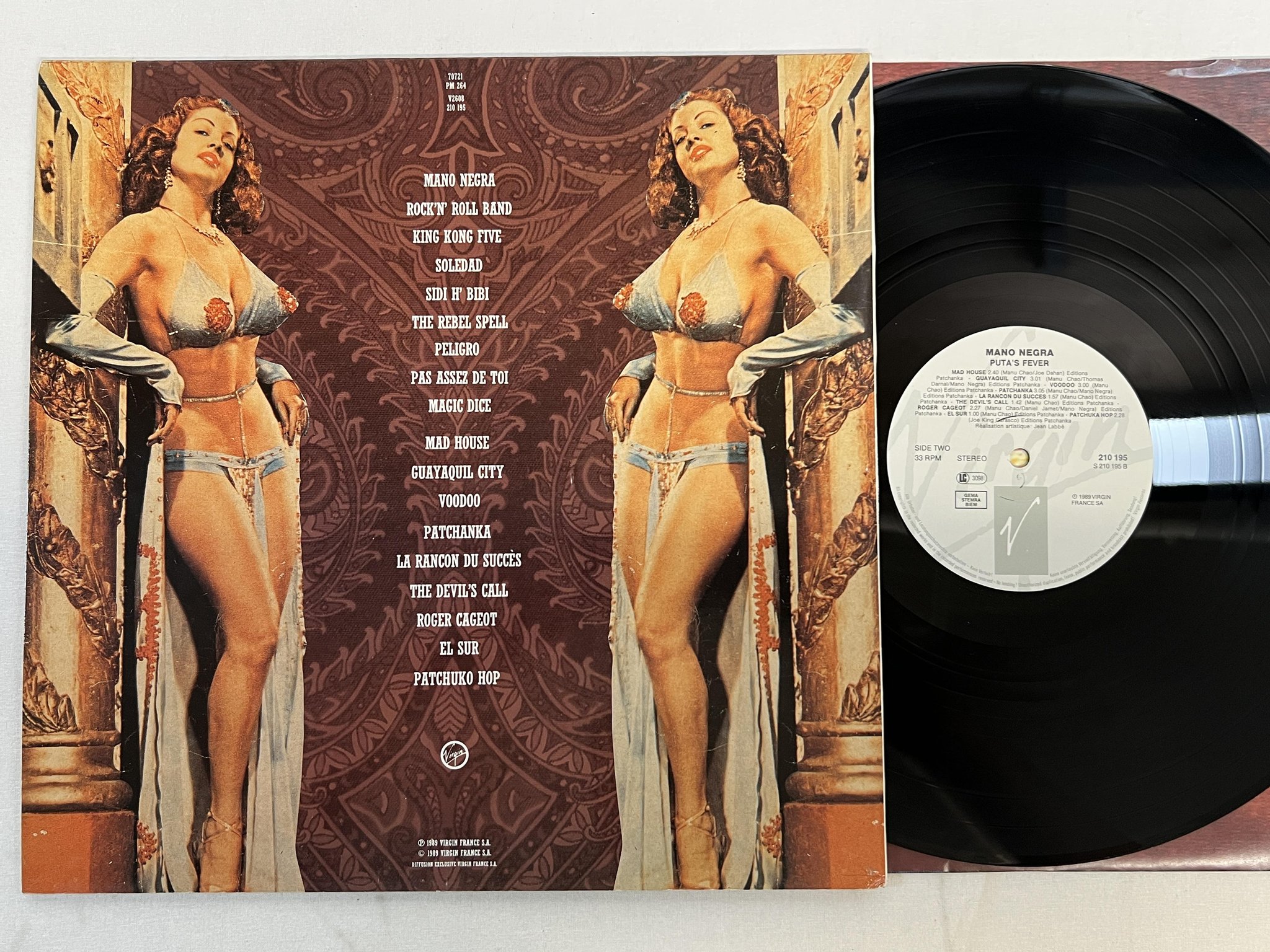 Omslagsbild för skivan MANO NEGRA puta's fever LP -89 VIRGIN 210195