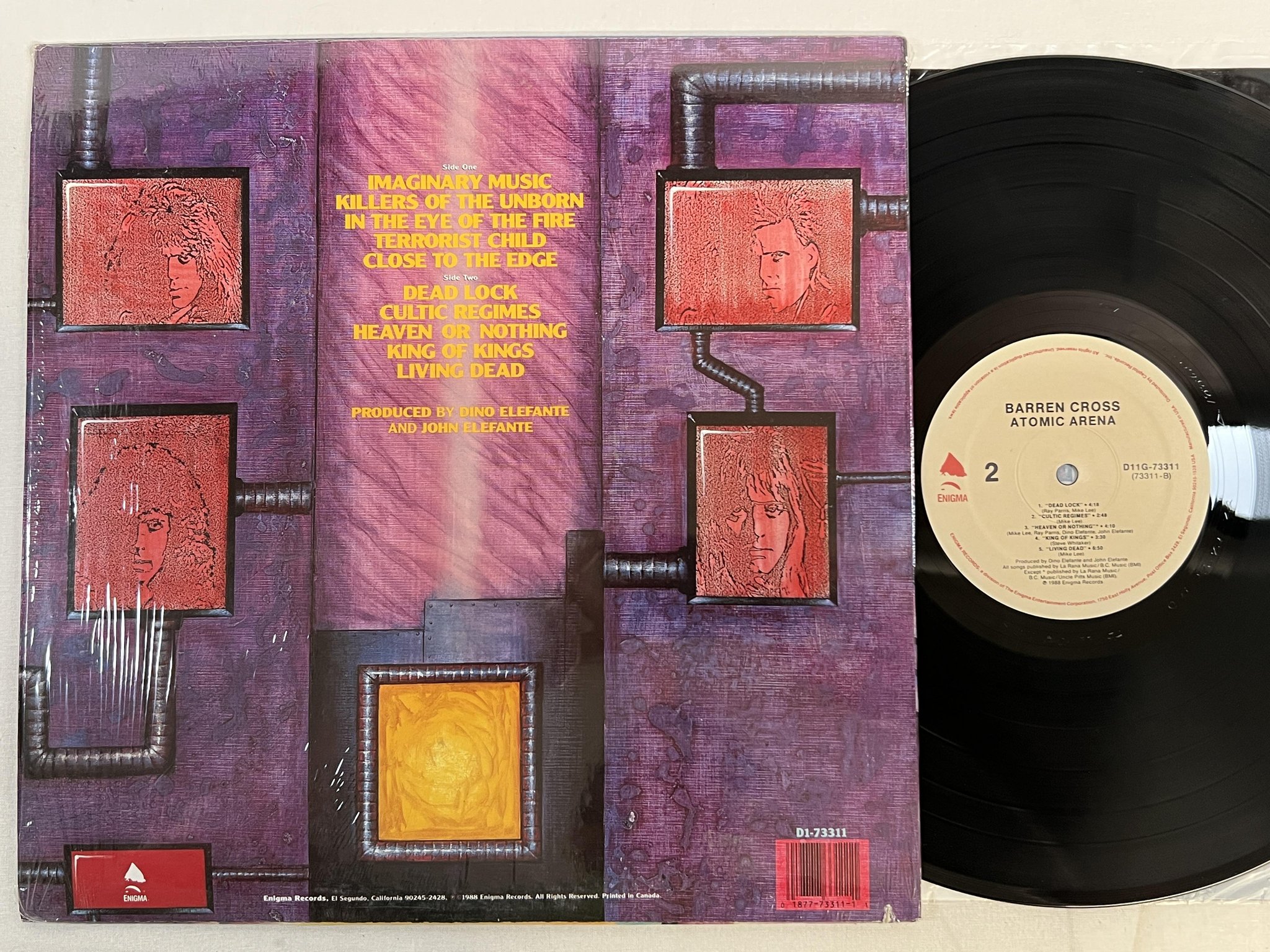 Omslagsbild för skivan BARREN CROSS Atomic Arena LP -88 Can ENIGMA D1 73311