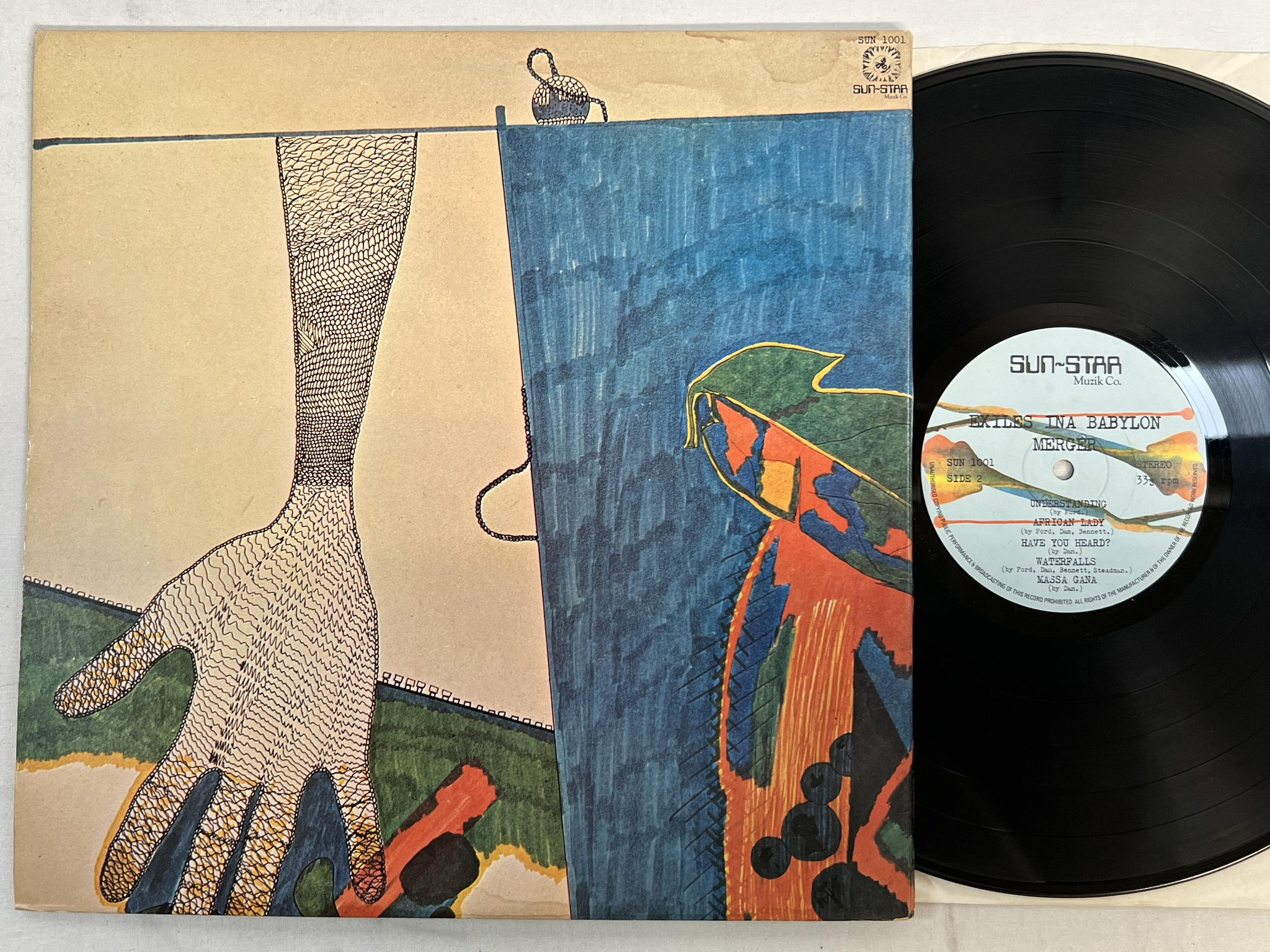 Omslagsbild för skivan MERGER exiles ina Babylon LP -77 UK SUN-STAR MUZIK CO. SUN 1001