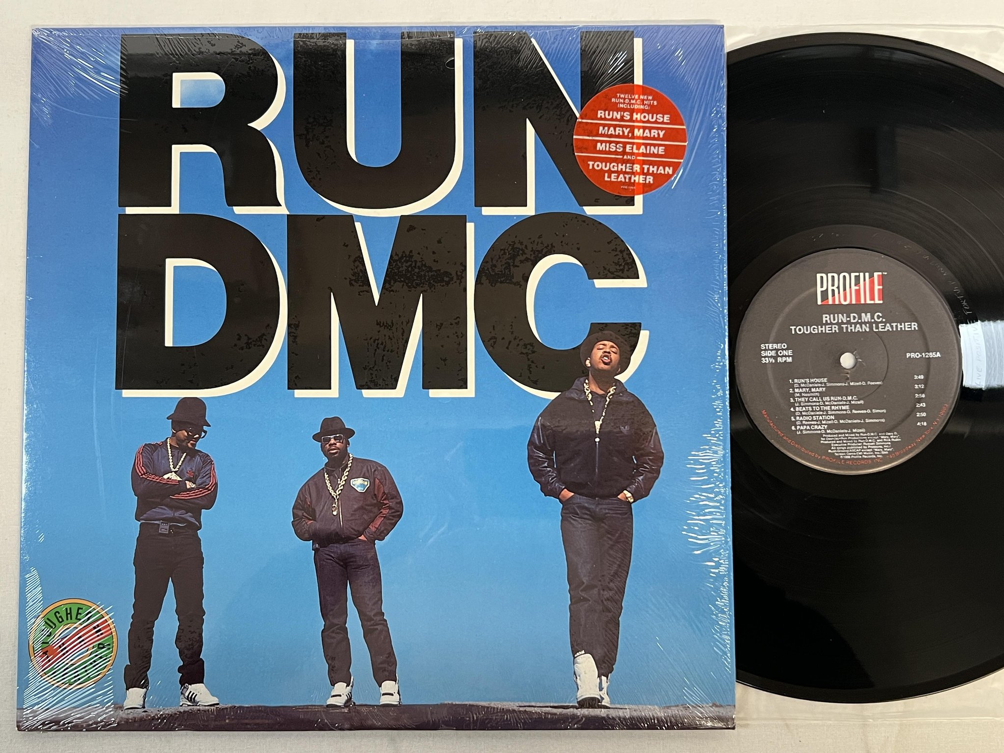 Omslagsbild för skivan RUN DMC tougher than leather LP -88 US PROFILE PRO 1265 **hype sticker **