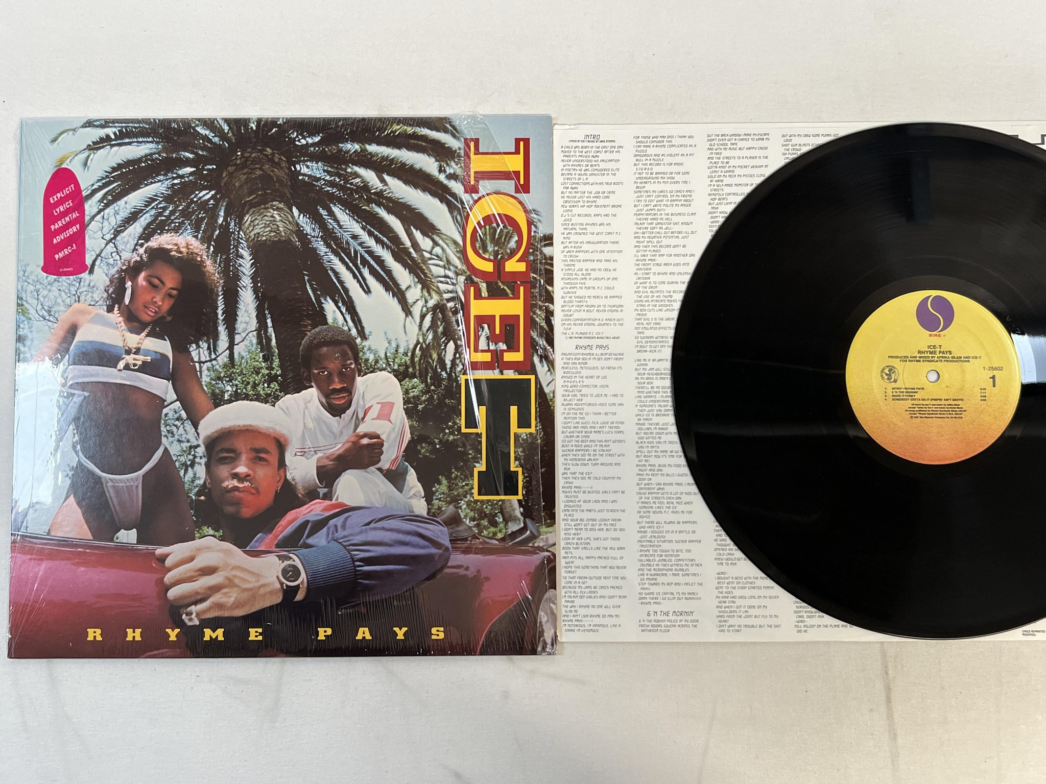 Omslagsbild för skivan ICE T rhyme pays LP -87 US SIRE 1-25602 ** hype sticker **