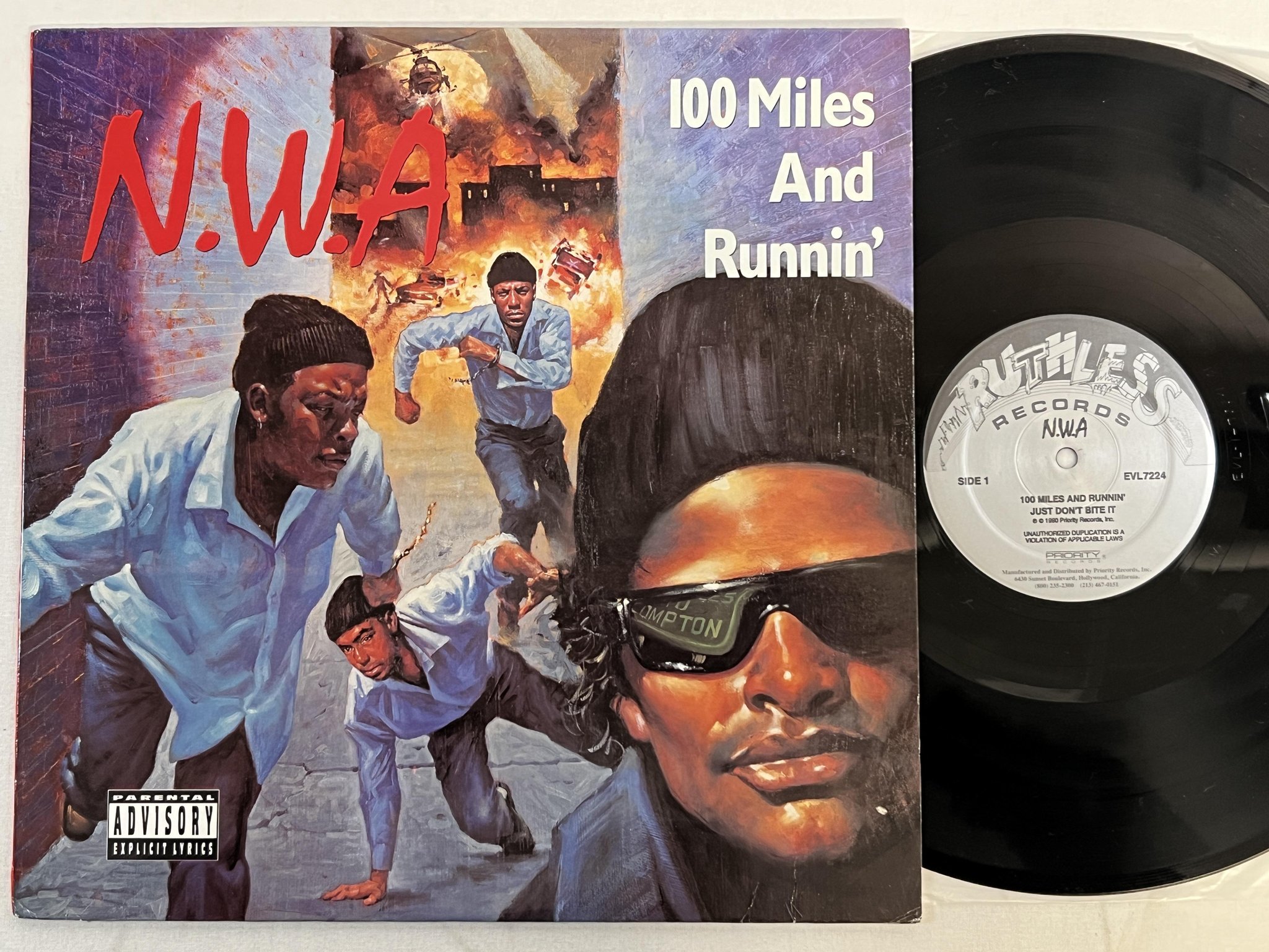 Omslagsbild för skivan N.W.A. 100 miles and running LP -90 US RUTHLESS EVL7224