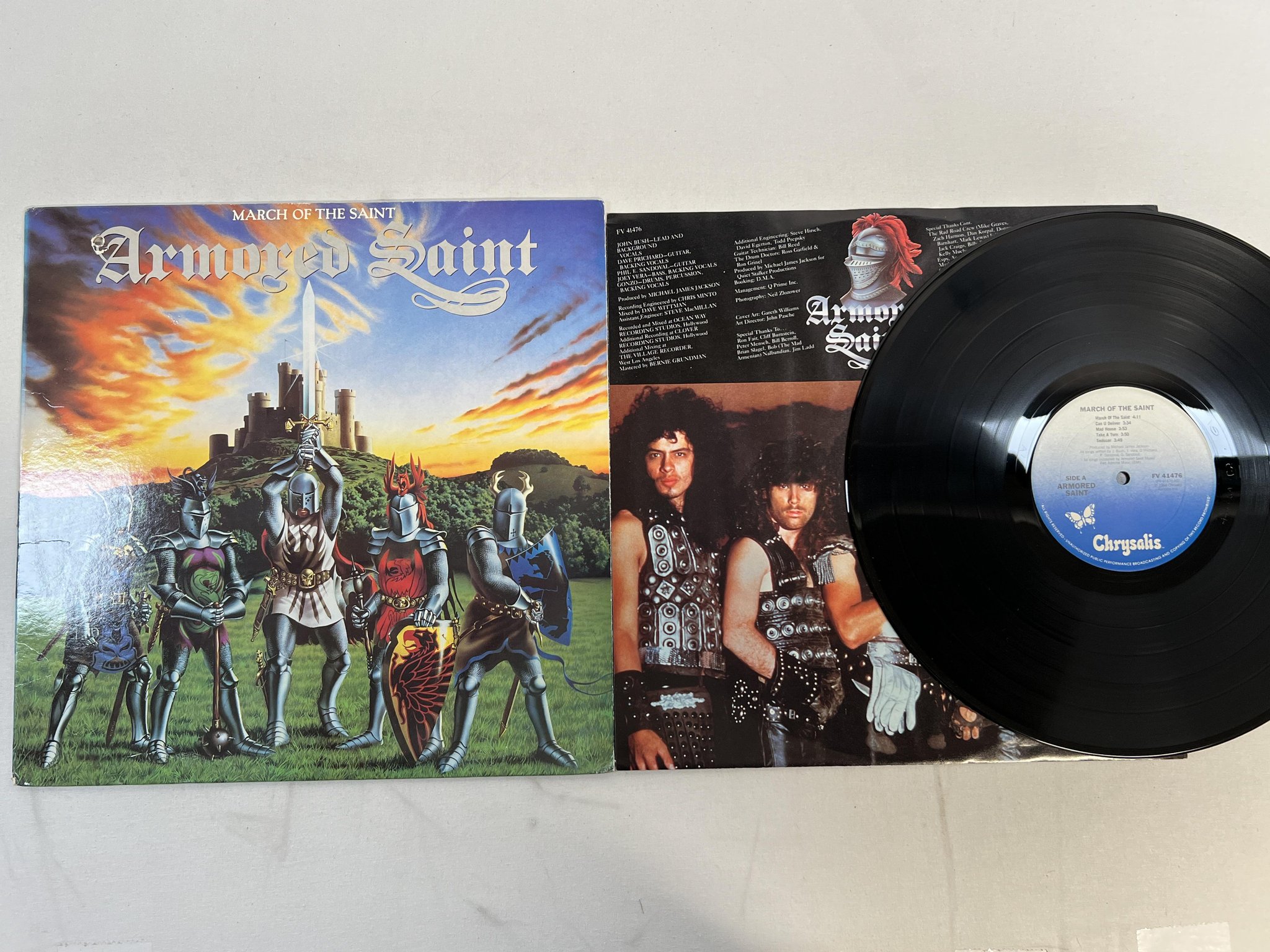 Omslagsbild för skivan ARMORED SAINT march of the saint LP -84 US CHRYSALIS FV 41476