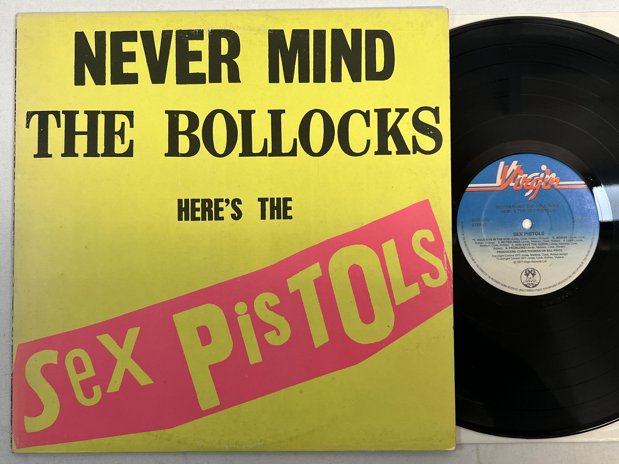 Omslagsbild för skivan SEX PISTOLS never mind the bollocks LP -77 UK VIRGIN V 2086