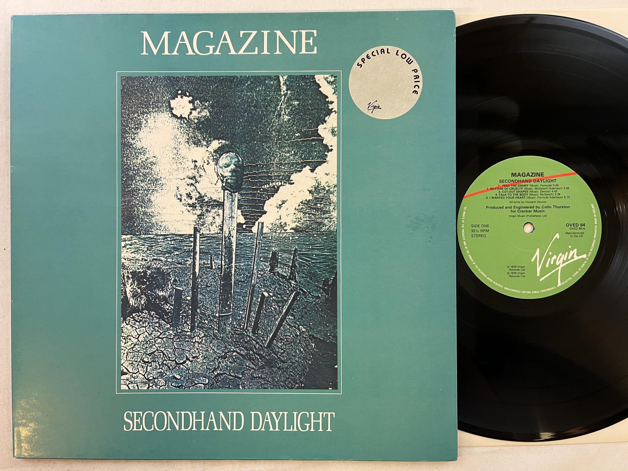 Omslagsbild för skivan MAGAZINE secondhand daylight LP -79 UK VIRIGN OVED 84