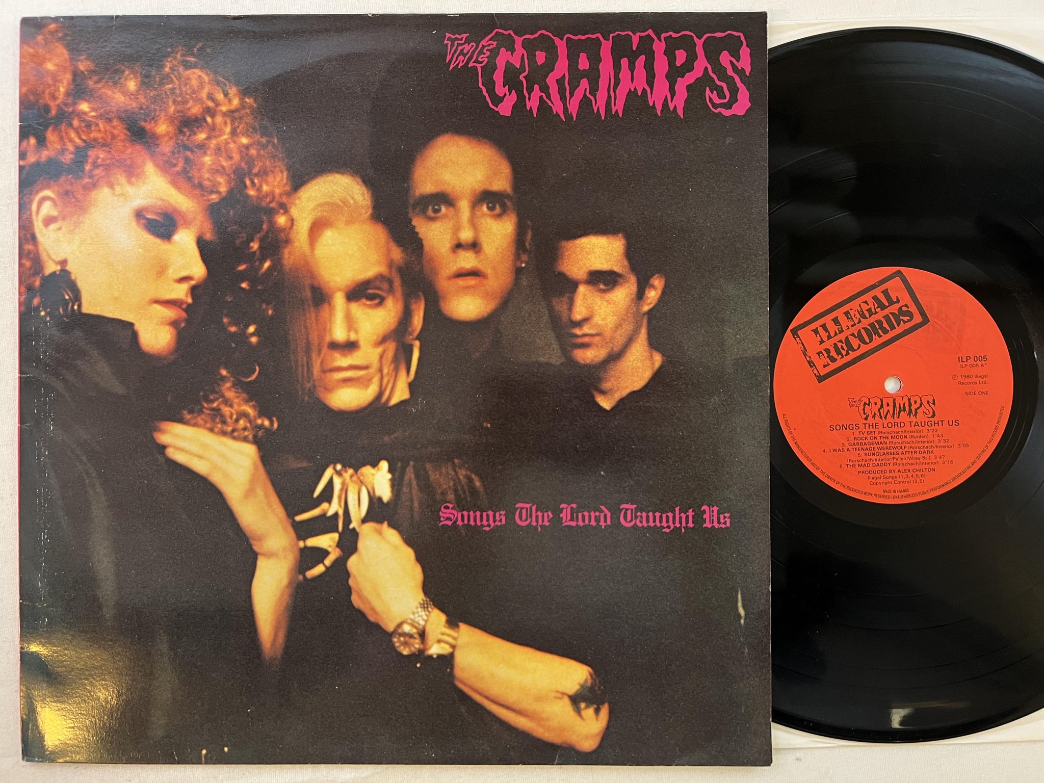Omslagsbild för skivan THE CRAMPS songs the lord taught us LP -80 ILLEGAL ILP 005 ** garage rock **