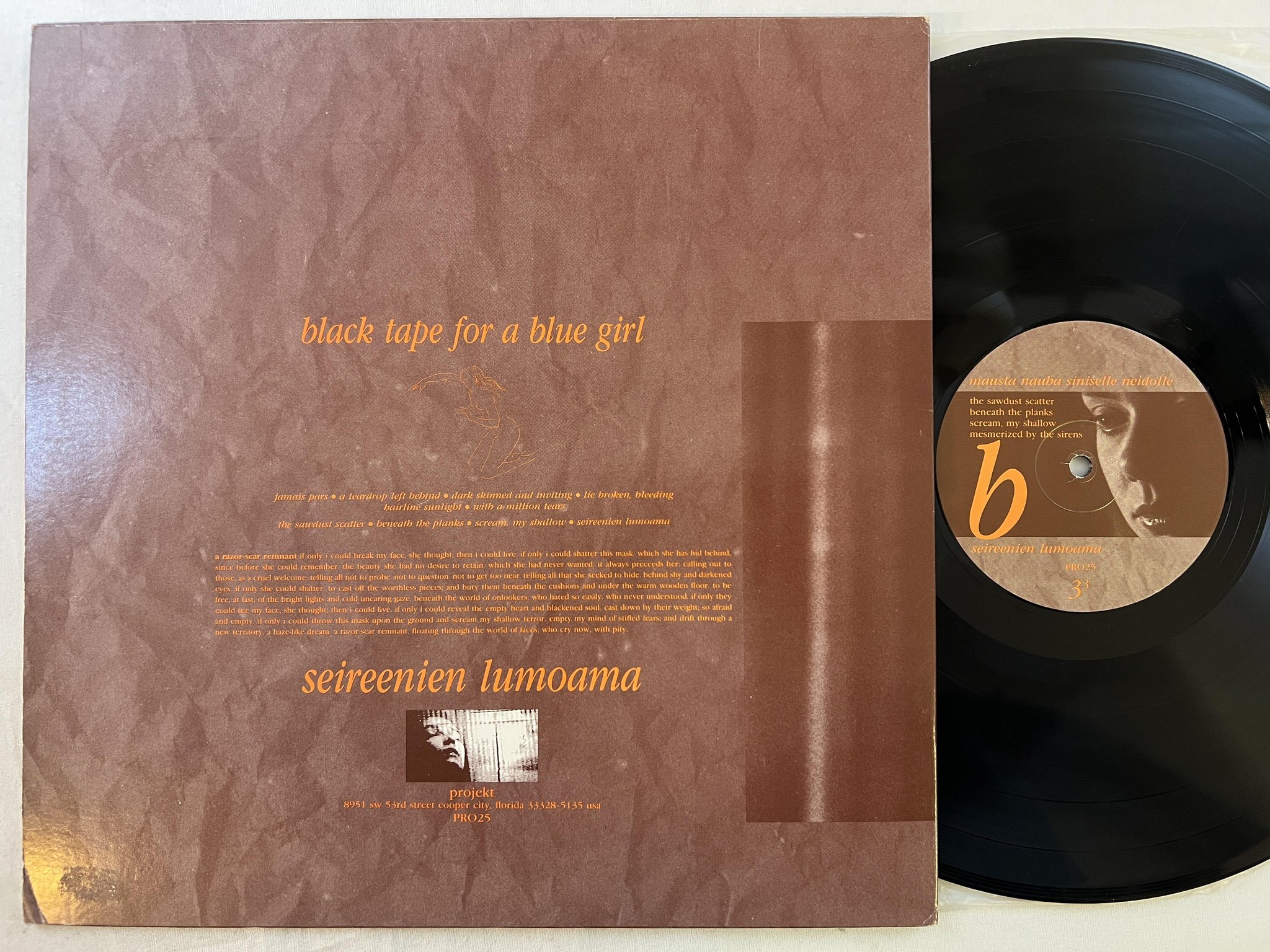 Omslagsbild för skivan BLACK TAPE FOR A BLUE GIRL Mesmerized By The Sirens LP -87 projekt PRO25