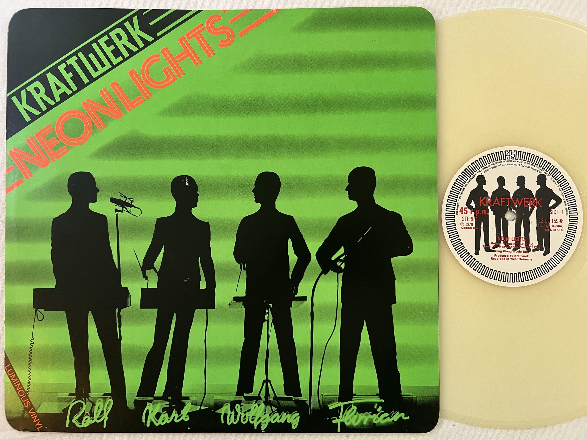 Omslagsbild för skivan KRAFTWERK neonlights 12"single CAPITOL 12CL 15998 *** luminous vinyl ***