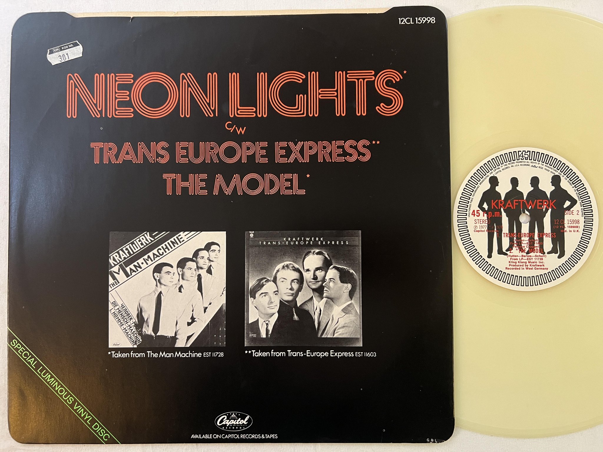 Omslagsbild för skivan KRAFTWERK neonlights 12"single CAPITOL 12CL 15998 *** luminous vinyl ***