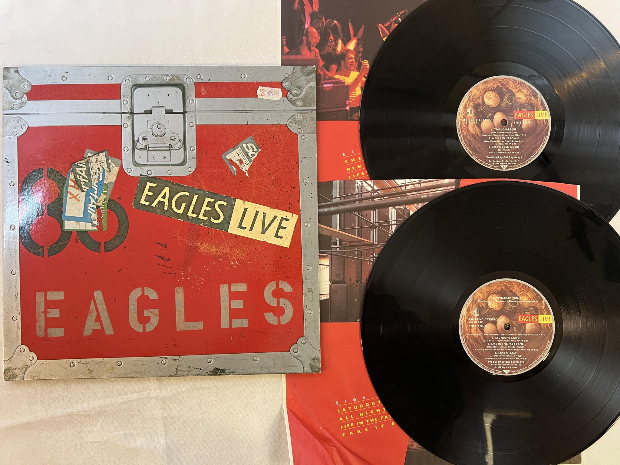 Omslagsbild för skivan EAGLES live 2xLP -80 Ger ASYLUM BB 705 w/ poster