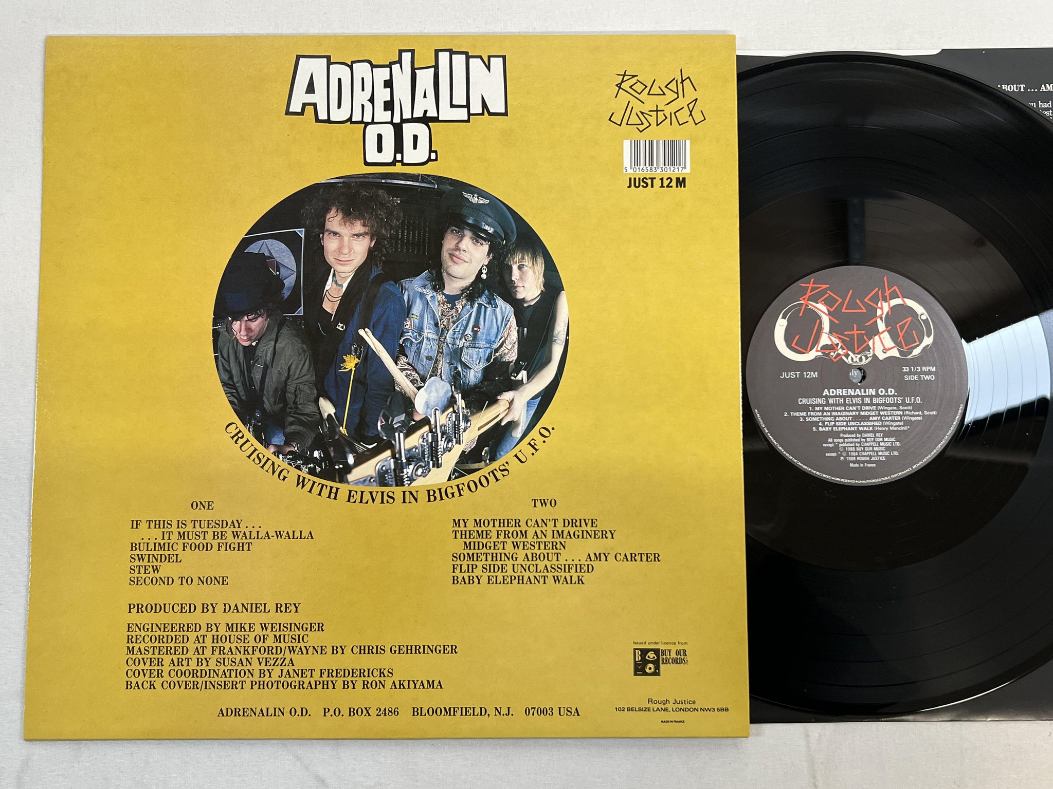 Omslagsbild för skivan ADRENALIN O.D. Cruising With Elvis In Bigfoots' U.F.O. LP -88 UK rough justice