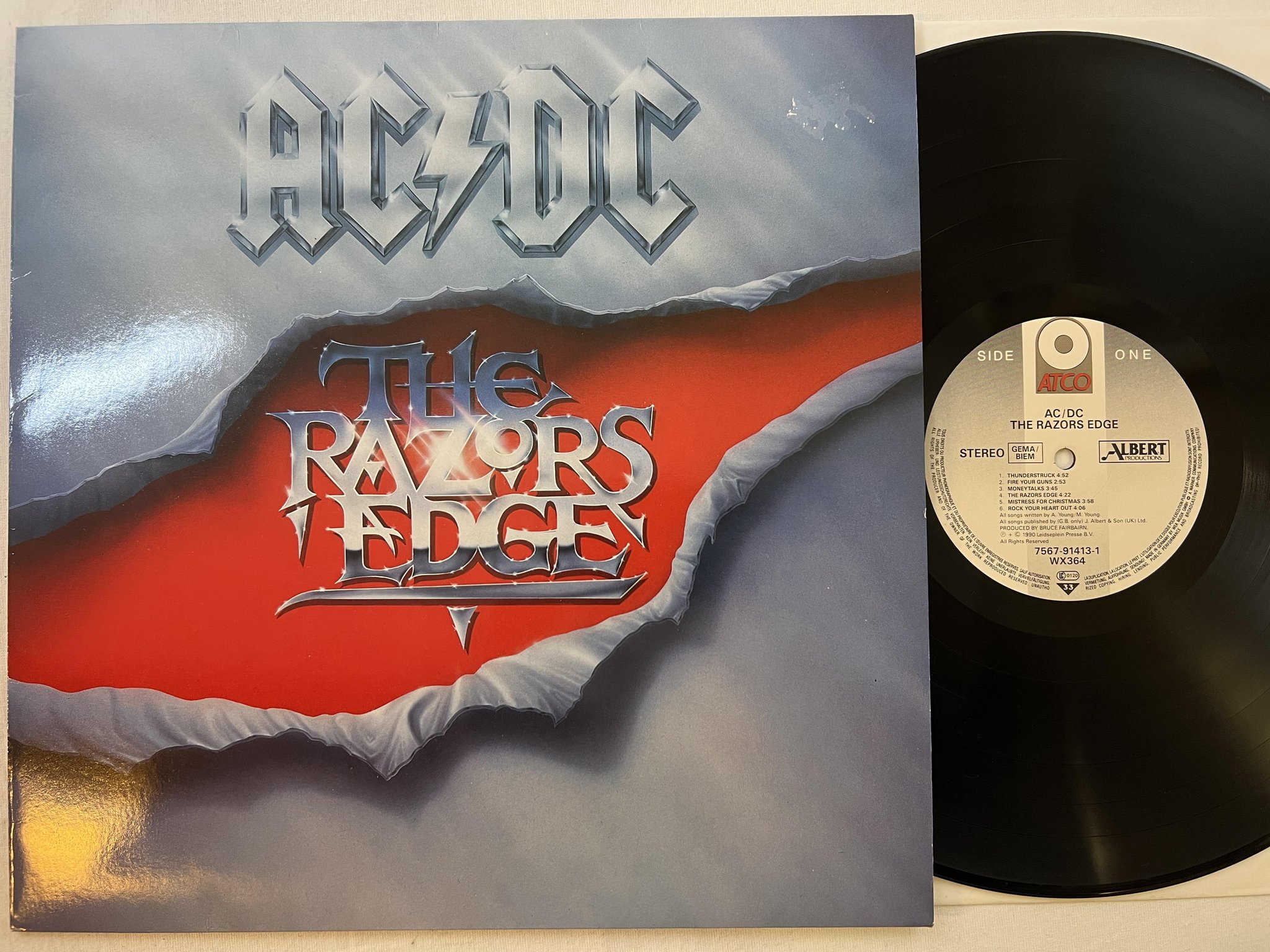 Omslagsbild för skivan AC/DC the razor edge LP -80 Ger ATCO 7567-91413-1