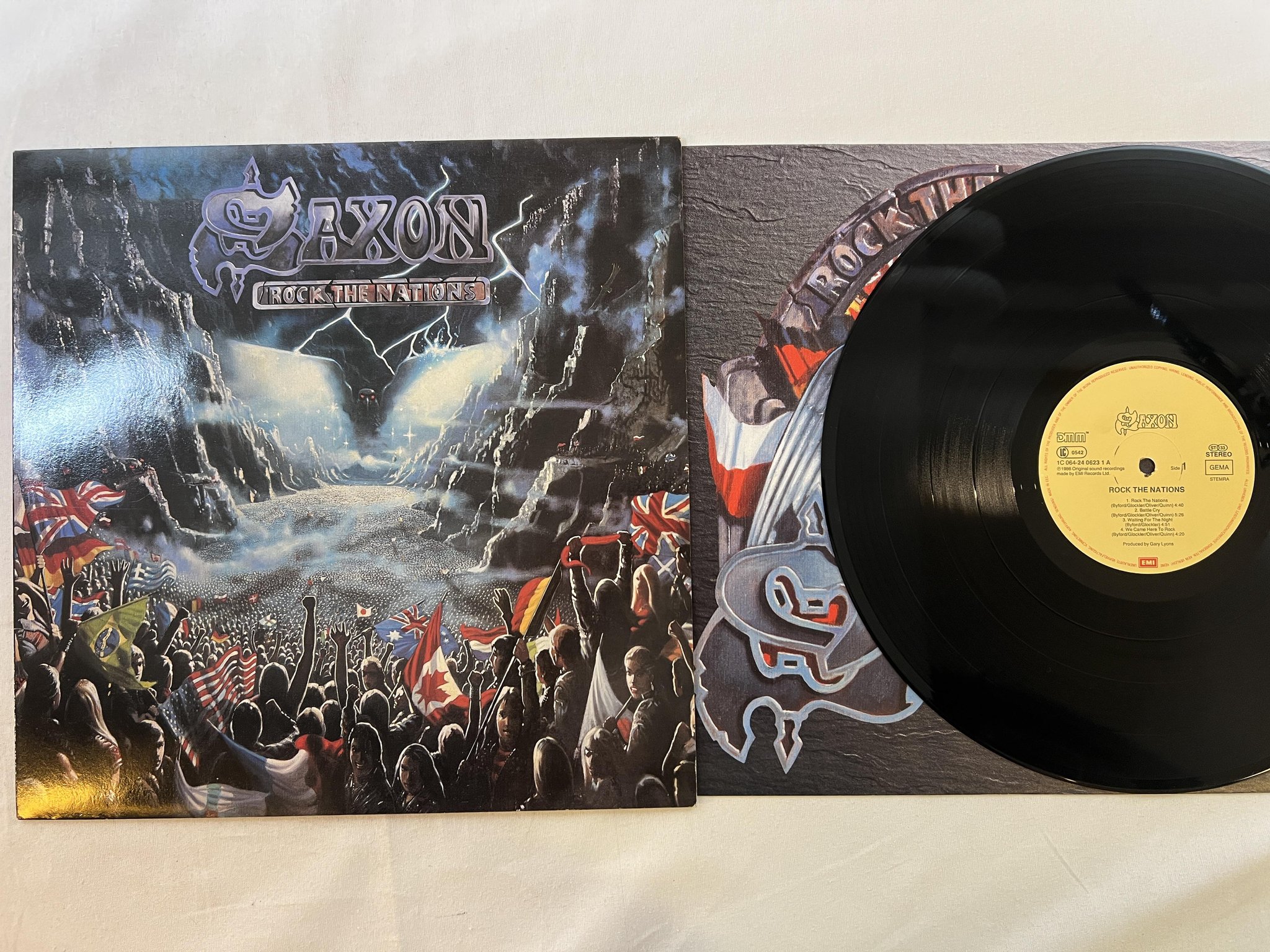 Omslagsbild för skivan SAXON rock the nations LP -86 Ger EMI 1C 064-2406231