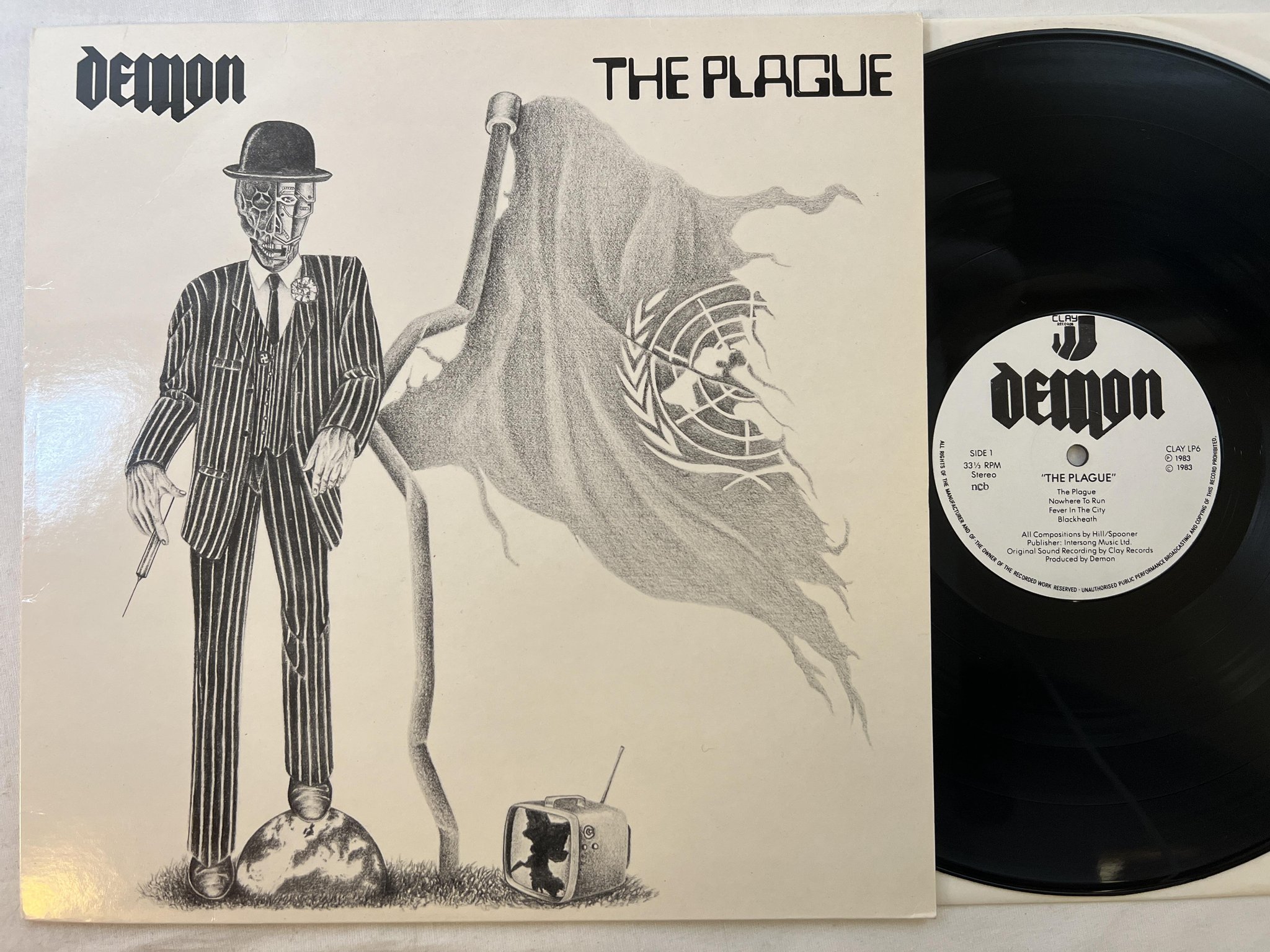 Omslagsbild för skivan DEMON the plague LP -83 ncb CLAY LP6