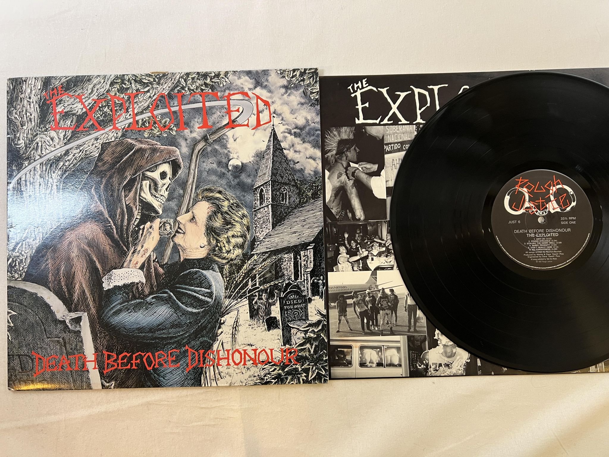 Omslagsbild för skivan THE EXPLOITED death before dishonour LP -87 ROUGH JUSTICE JUST 6
