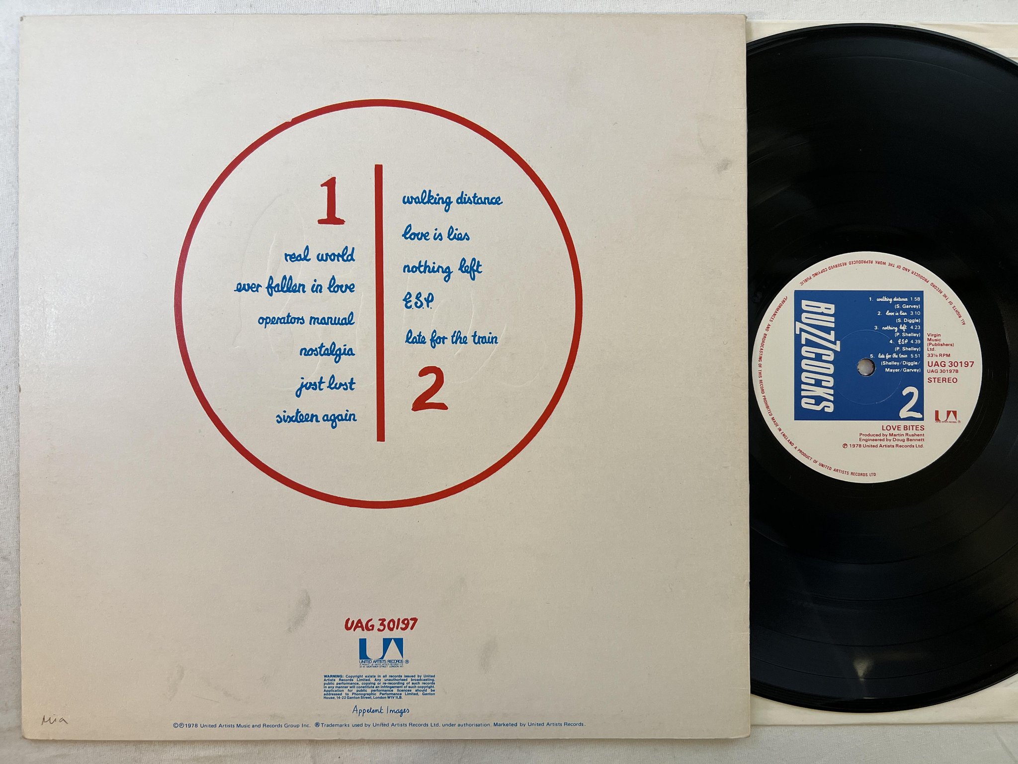 Omslagsbild för skivan BUZZCOCKS love bites LP -78 UK UNITED ARTISTS UAG 30197 ** Embossed cover **