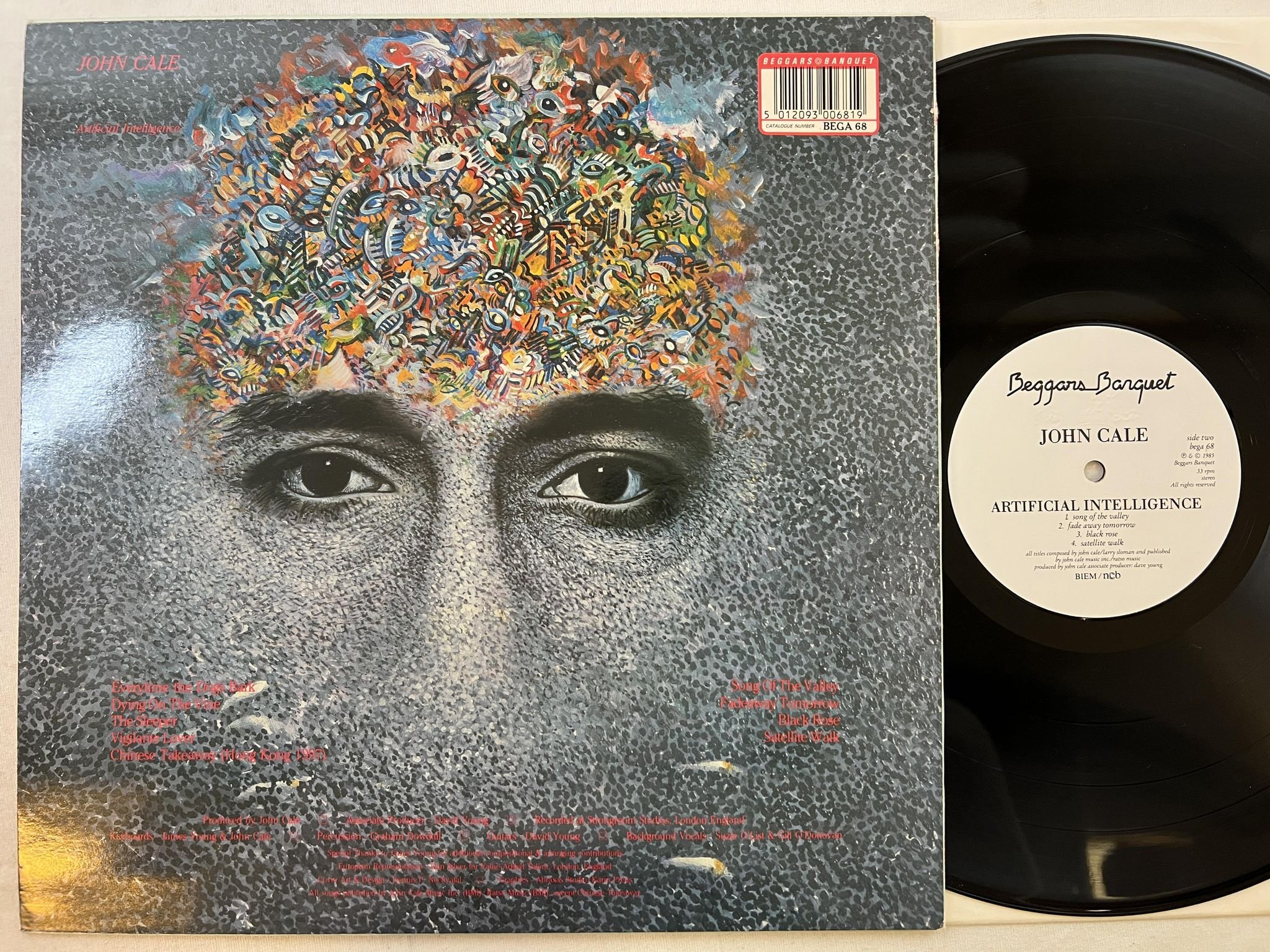 Omslagsbild för skivan JOHN CALE artificial intelligence LP -85 ncb BEGGARS BANQUET BEGA 68