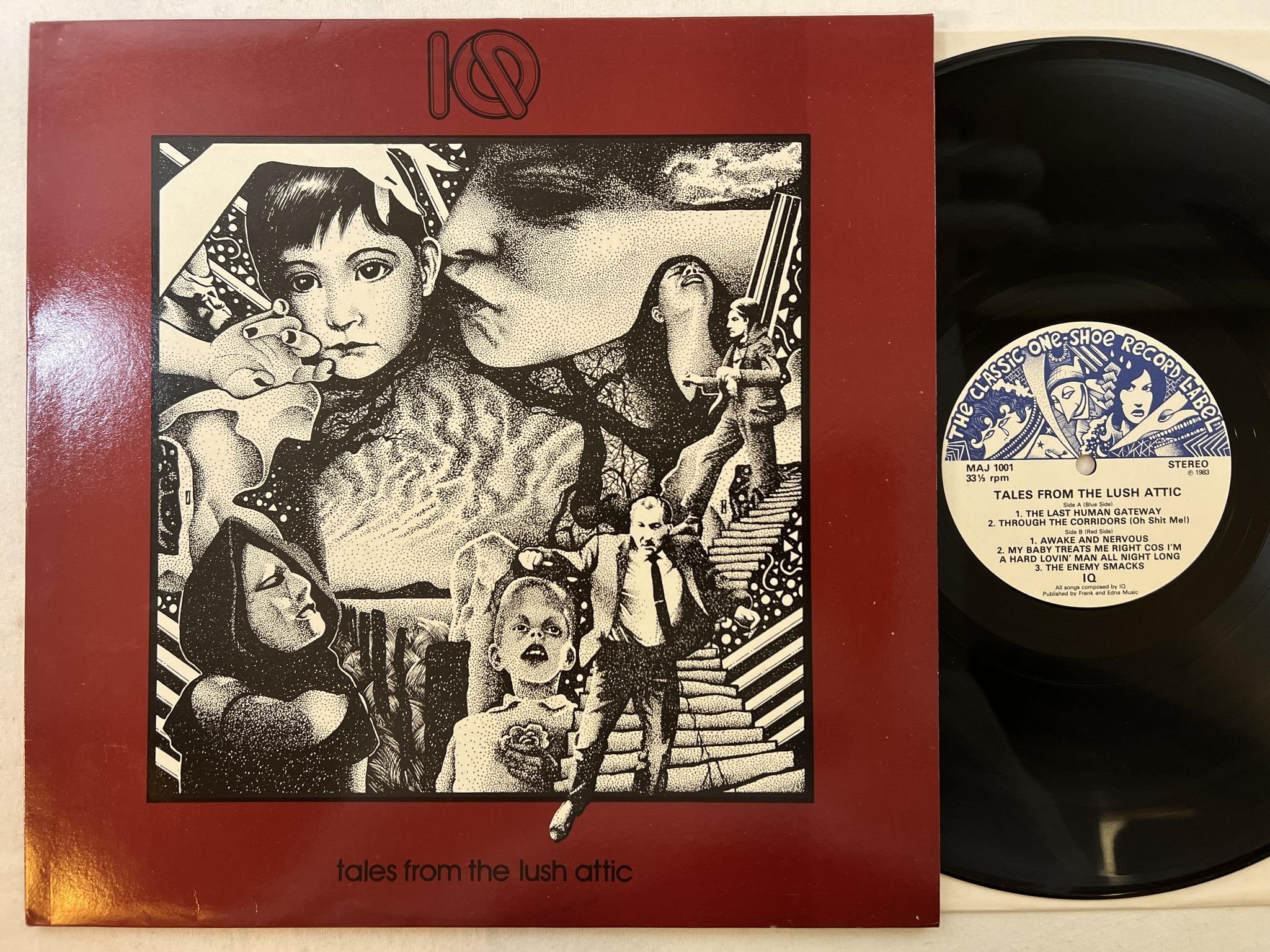 Omslagsbild för skivan IQ Tales From The Lush Attic LP -84 UK MAJ 1001 ** prog rock **