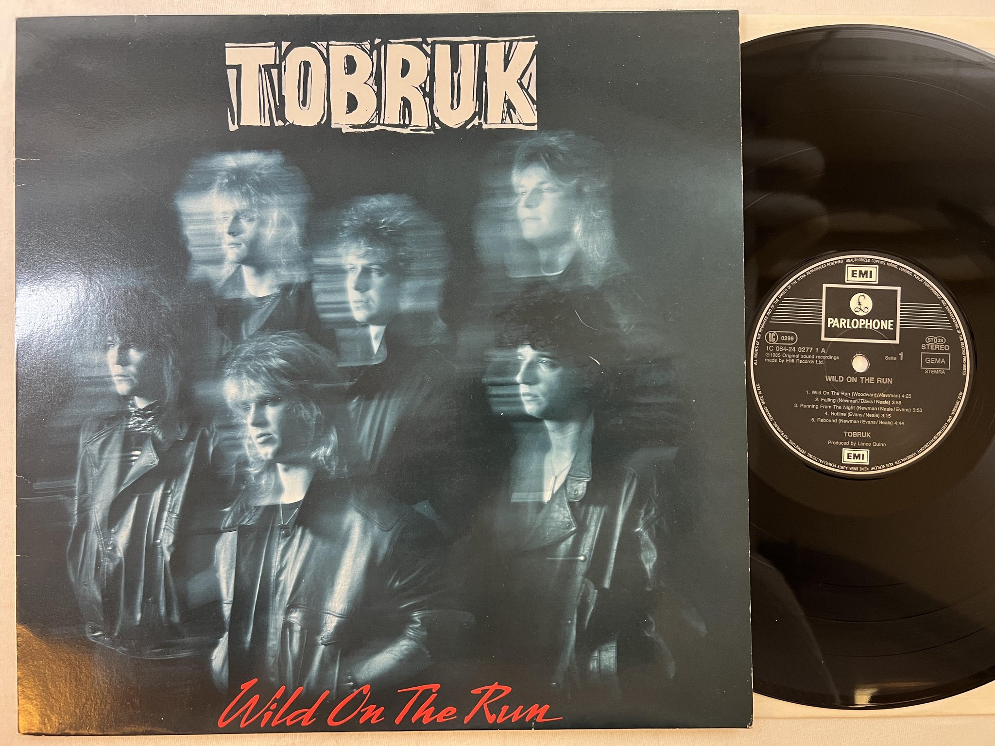 Omslagsbild för skivan TONBRUK Wild On The Run LP -85 Ger PARLOPHONE 1C 064-24 0277 1